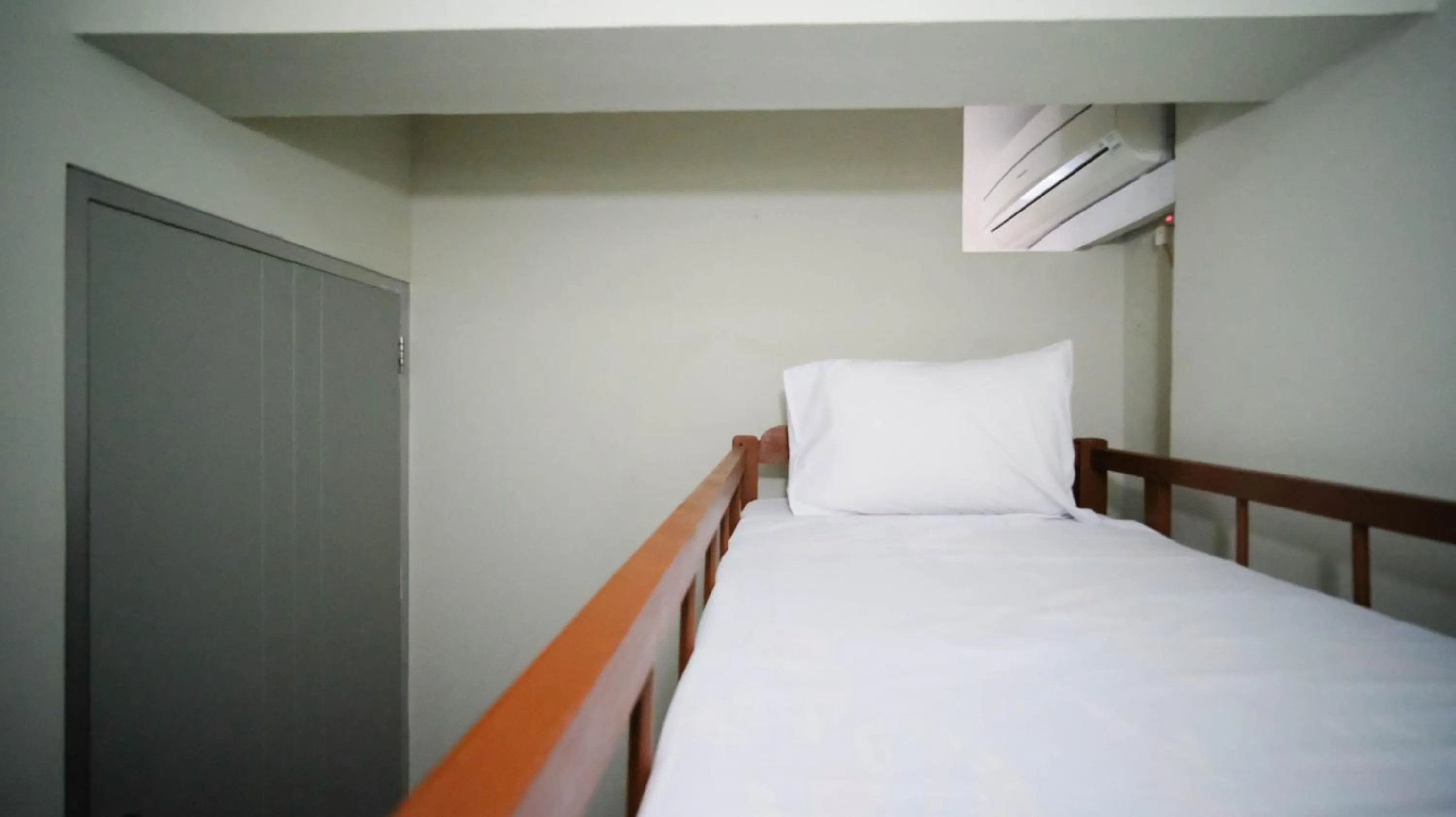 Bed in Homey and Comfy 2BR at Dian Regency Apartment By Travelio