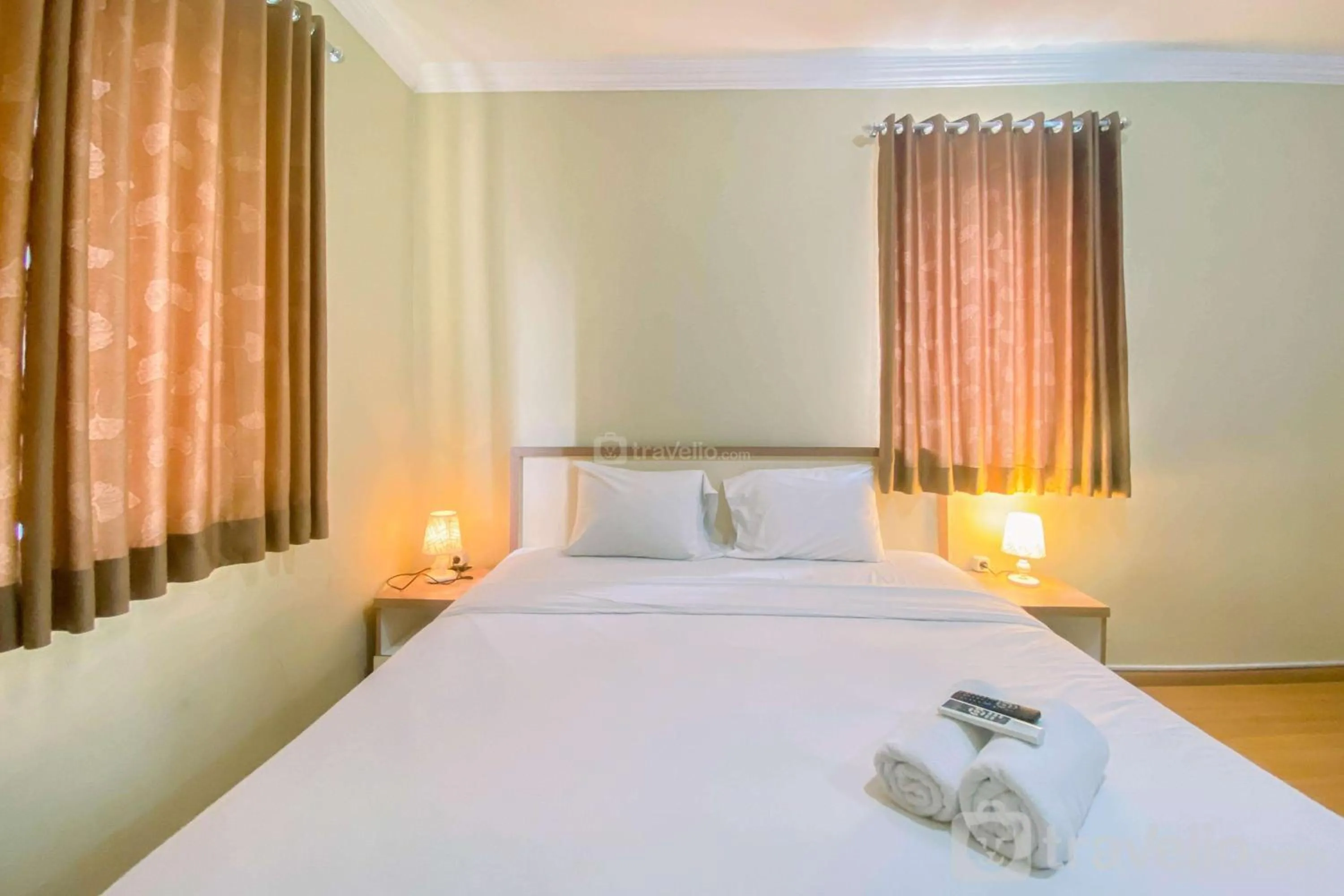 Bed in Relaxing 2BR at Grand Palace Kemayoran Apartment By Travelio