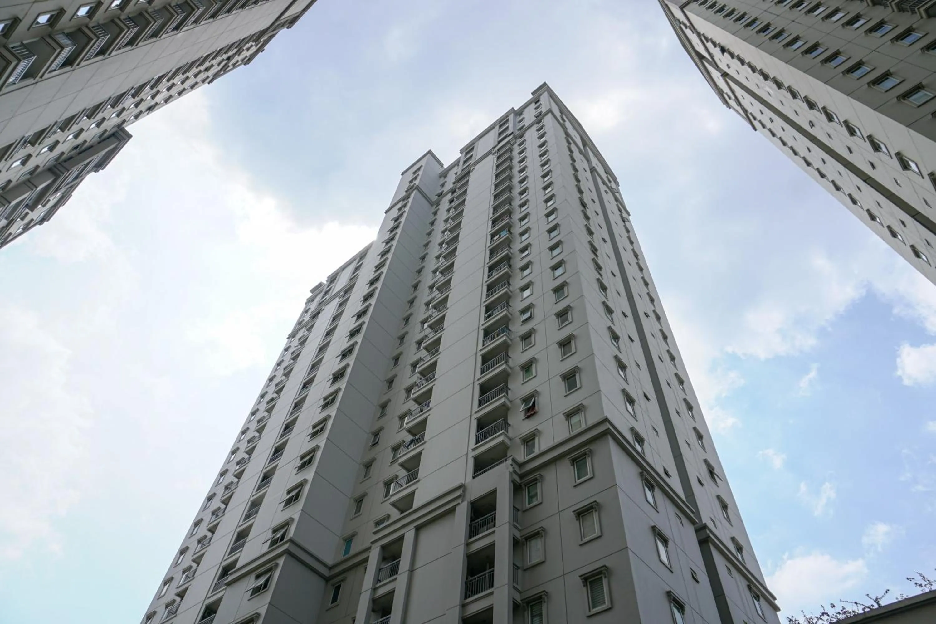 Property building in Relaxing 2BR at Grand Palace Kemayoran Apartment By Travelio