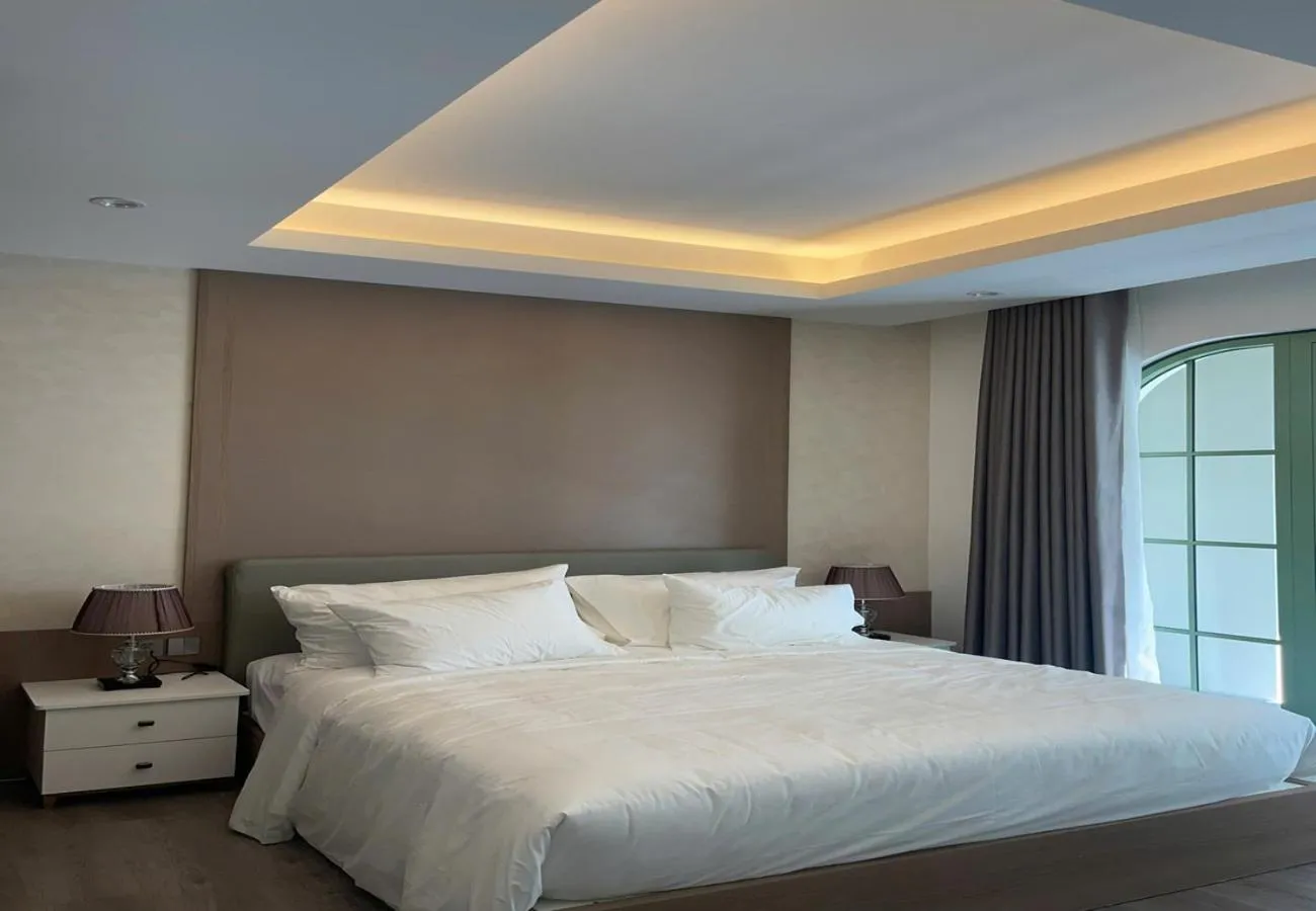 Bed in Elyday Apartment Hillside Phu Quoc - Sea & Firework view