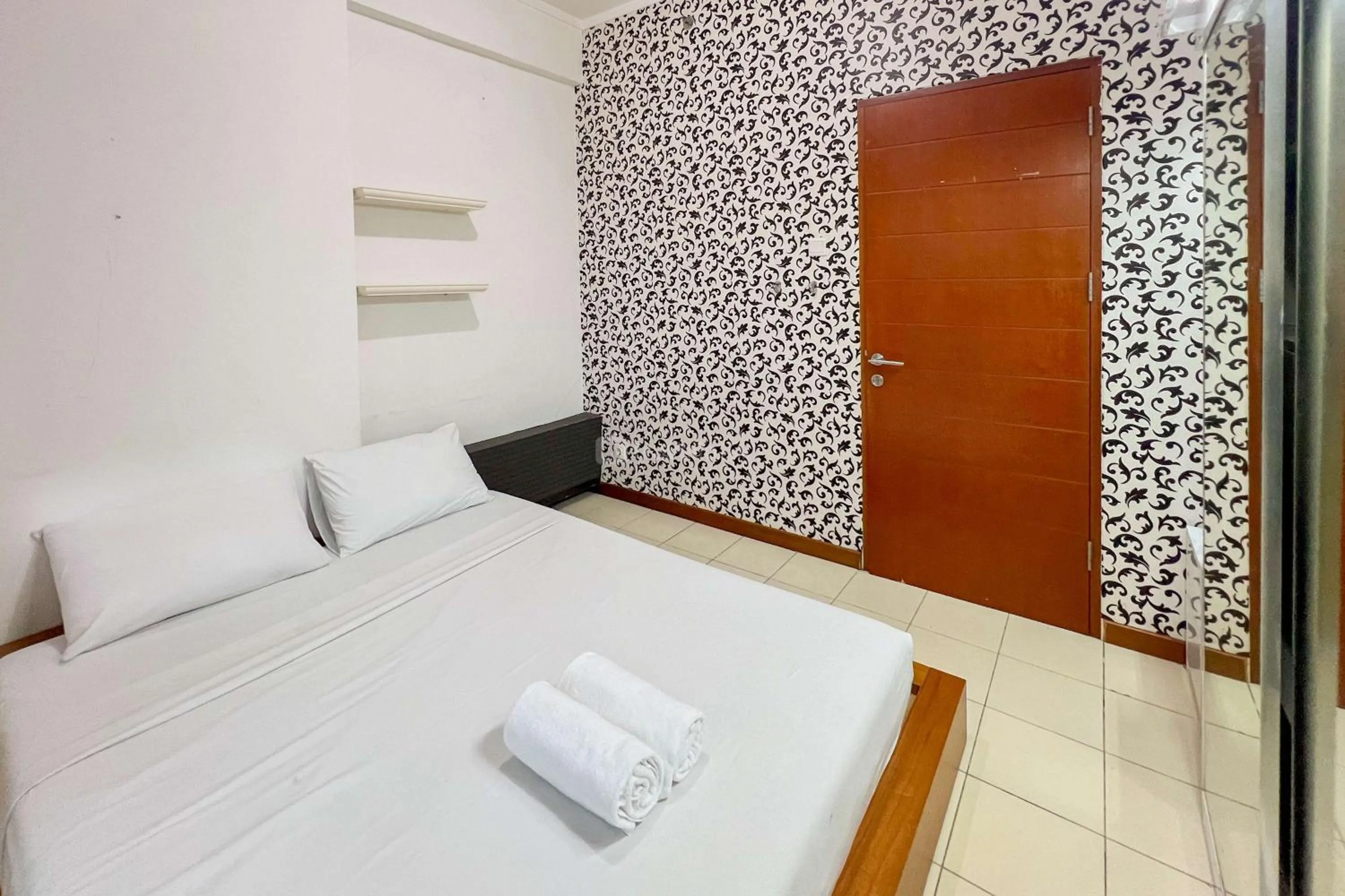 Bed in Cozy 1BR at Marbella Suites Dago Pakar Bandung Apartment By Travelio