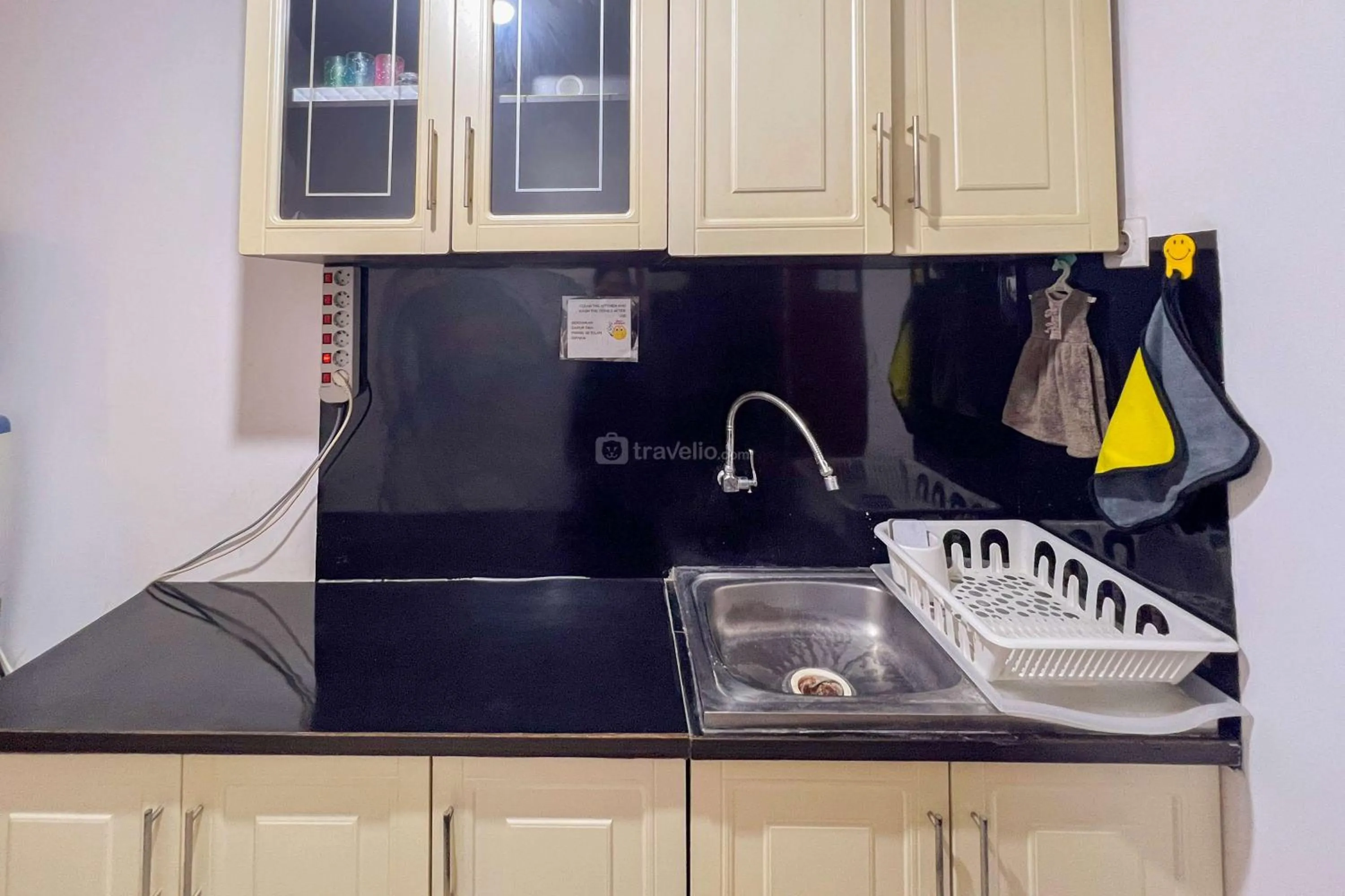 Kitchen or kitchenette in Cozy 1BR at Marbella Suites Dago Pakar Bandung Apartment By Travelio