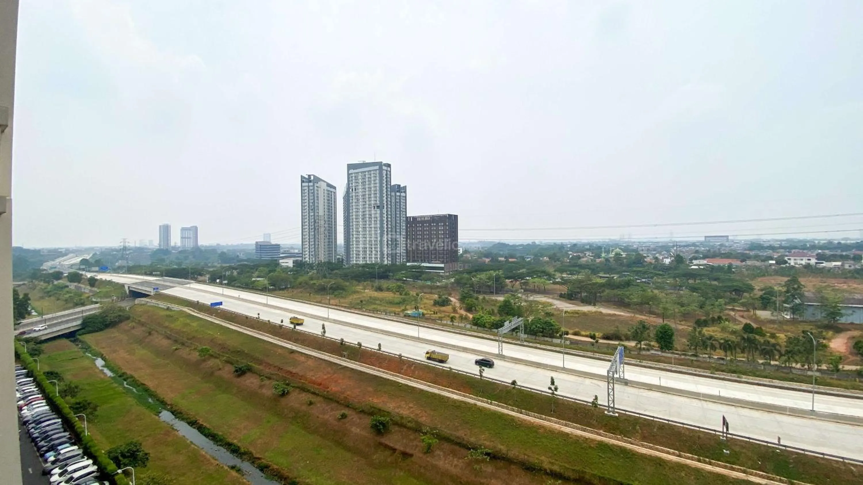 Bed in Best Choice and Nice Studio at Sky House BSD Apartment By Travelio