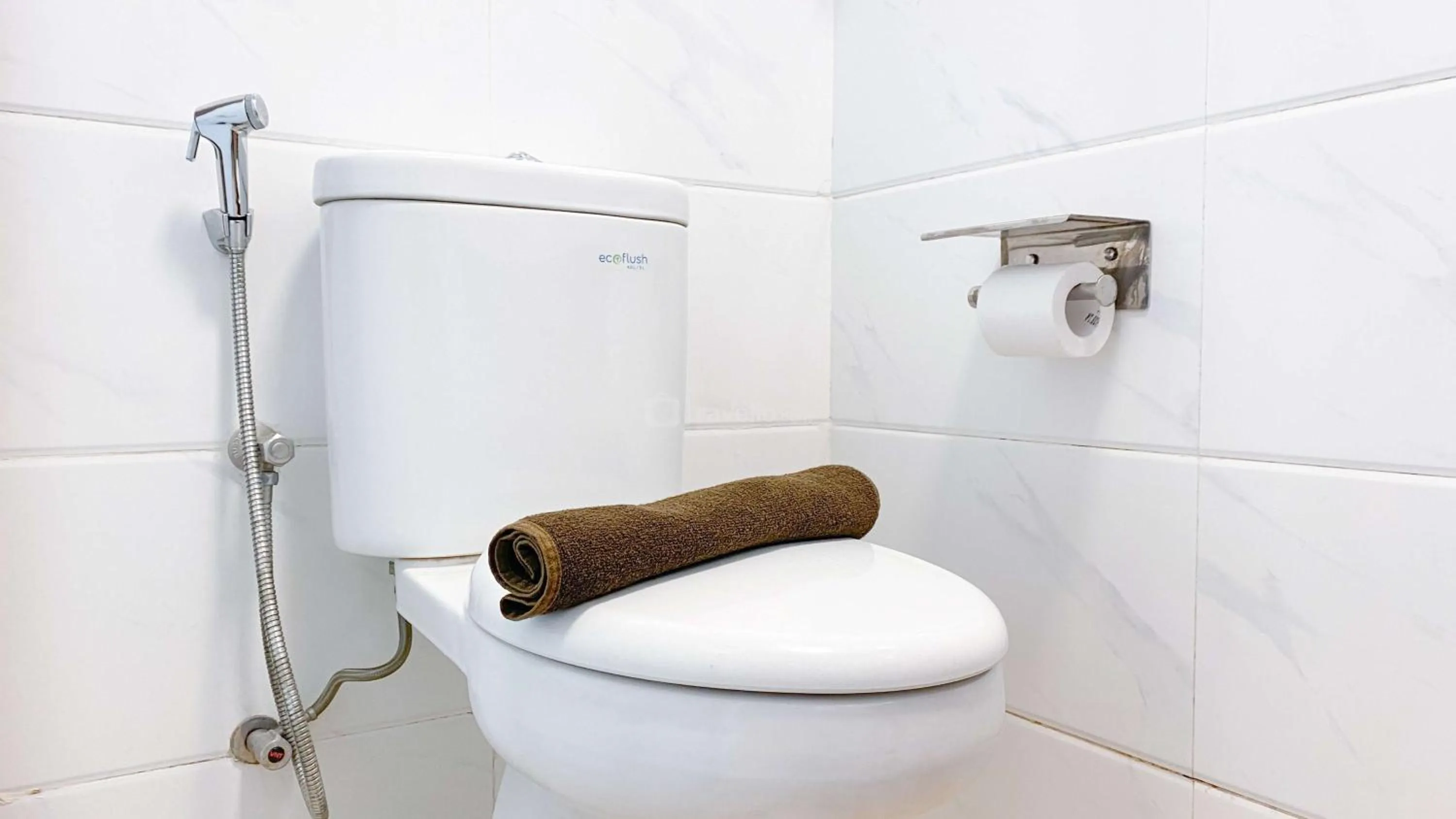 Bed in Best Choice and Nice Studio at Sky House BSD Apartment By Travelio