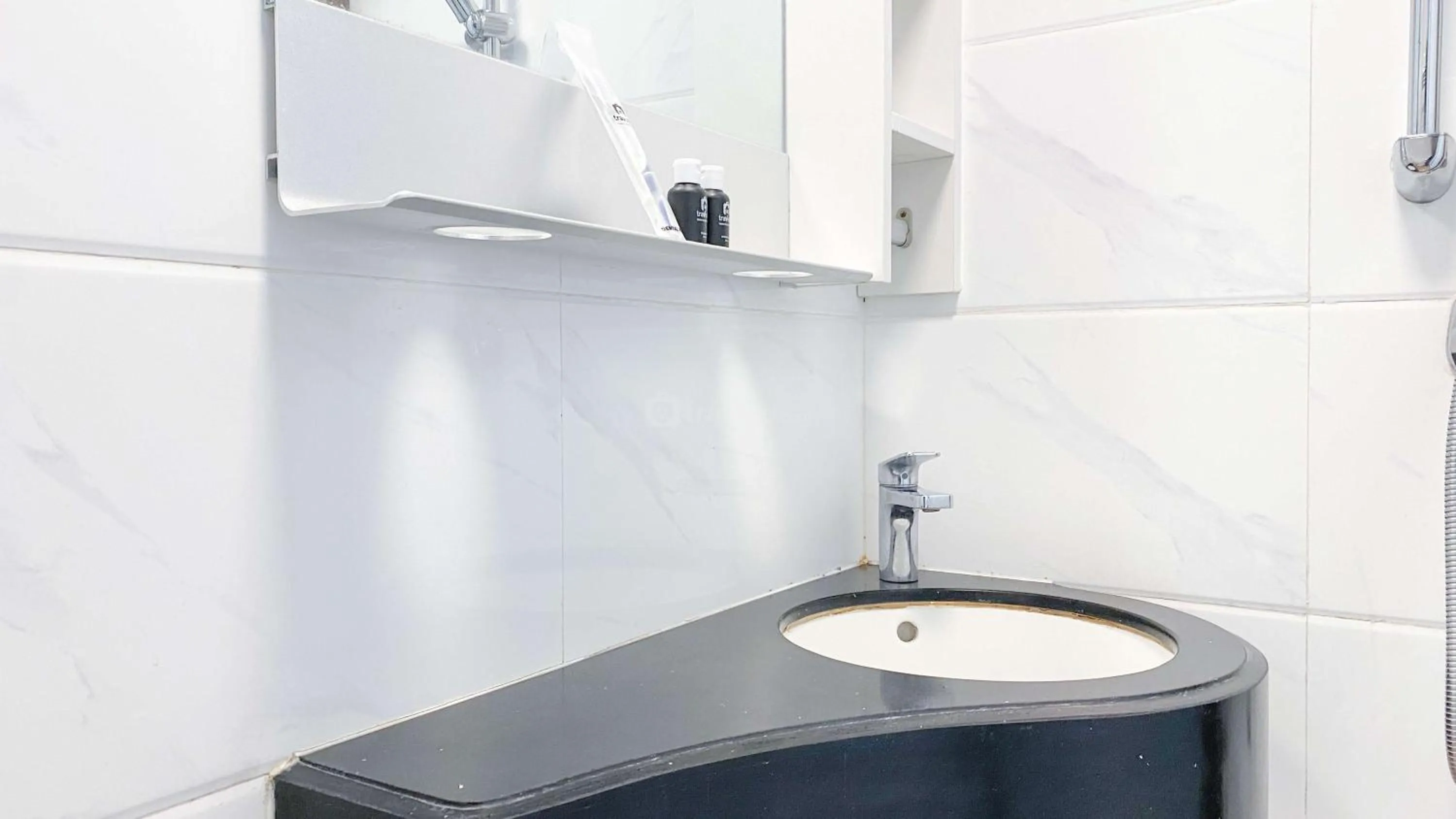 Bed in Best Choice and Nice Studio at Sky House BSD Apartment By Travelio