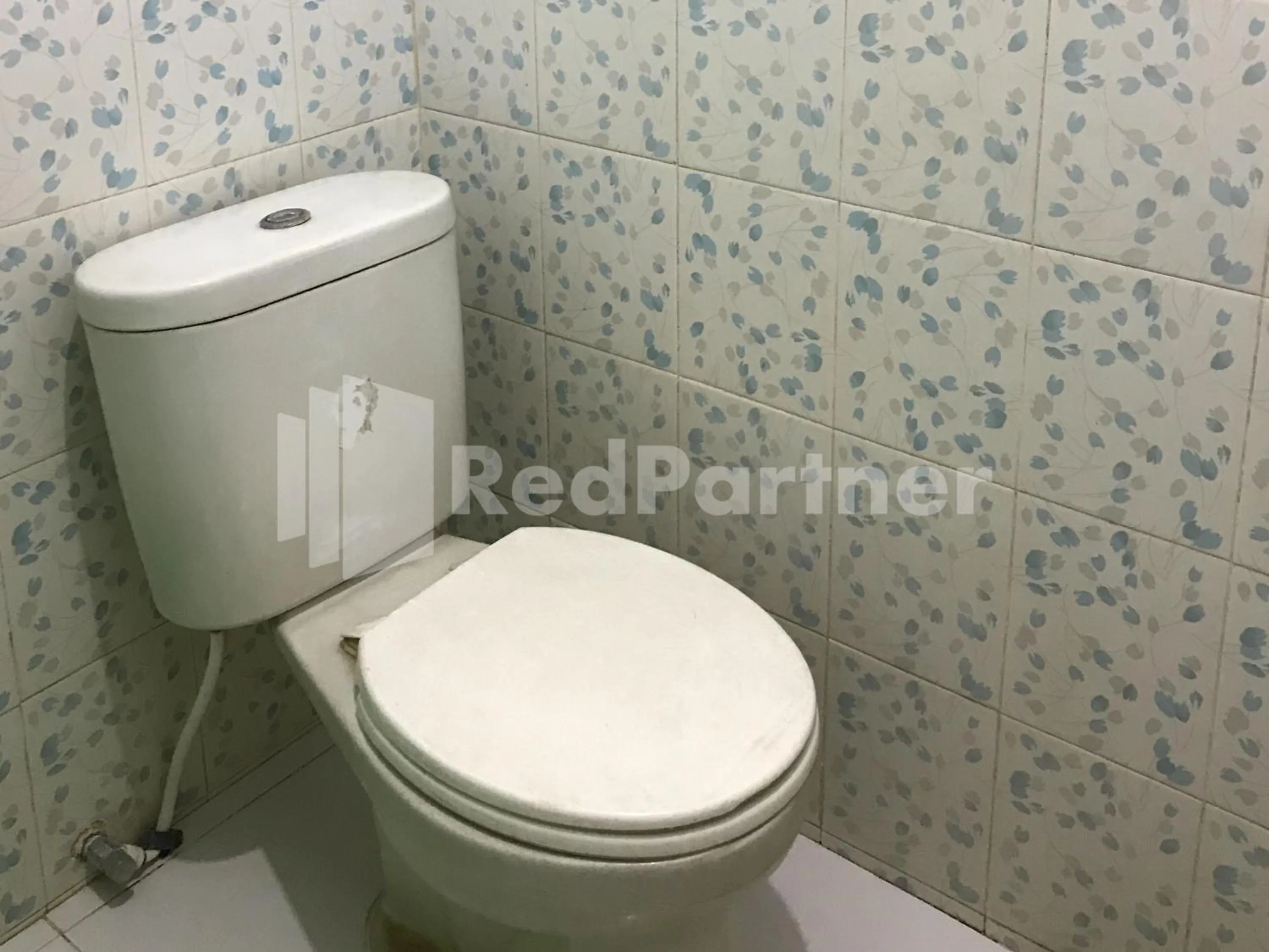 Bathroom in Hotel Gamary RedPartner Sidorejo