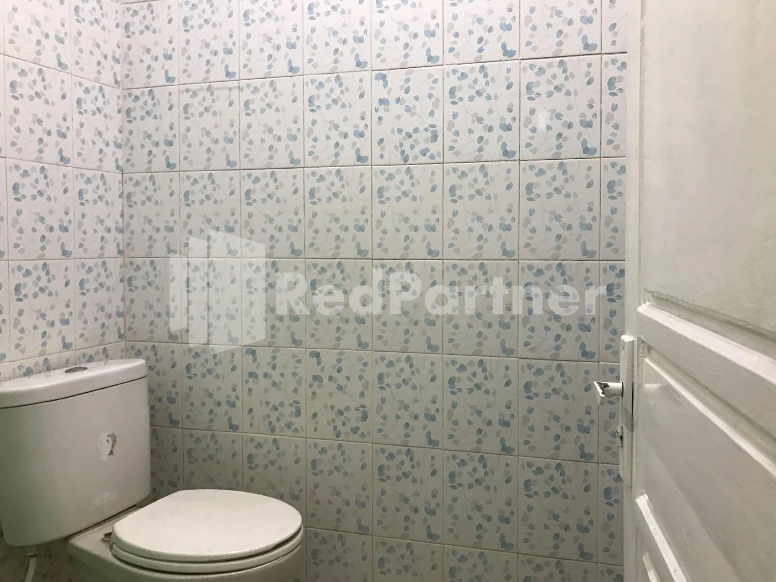 Bathroom in Hotel Gamary RedPartner Sidorejo