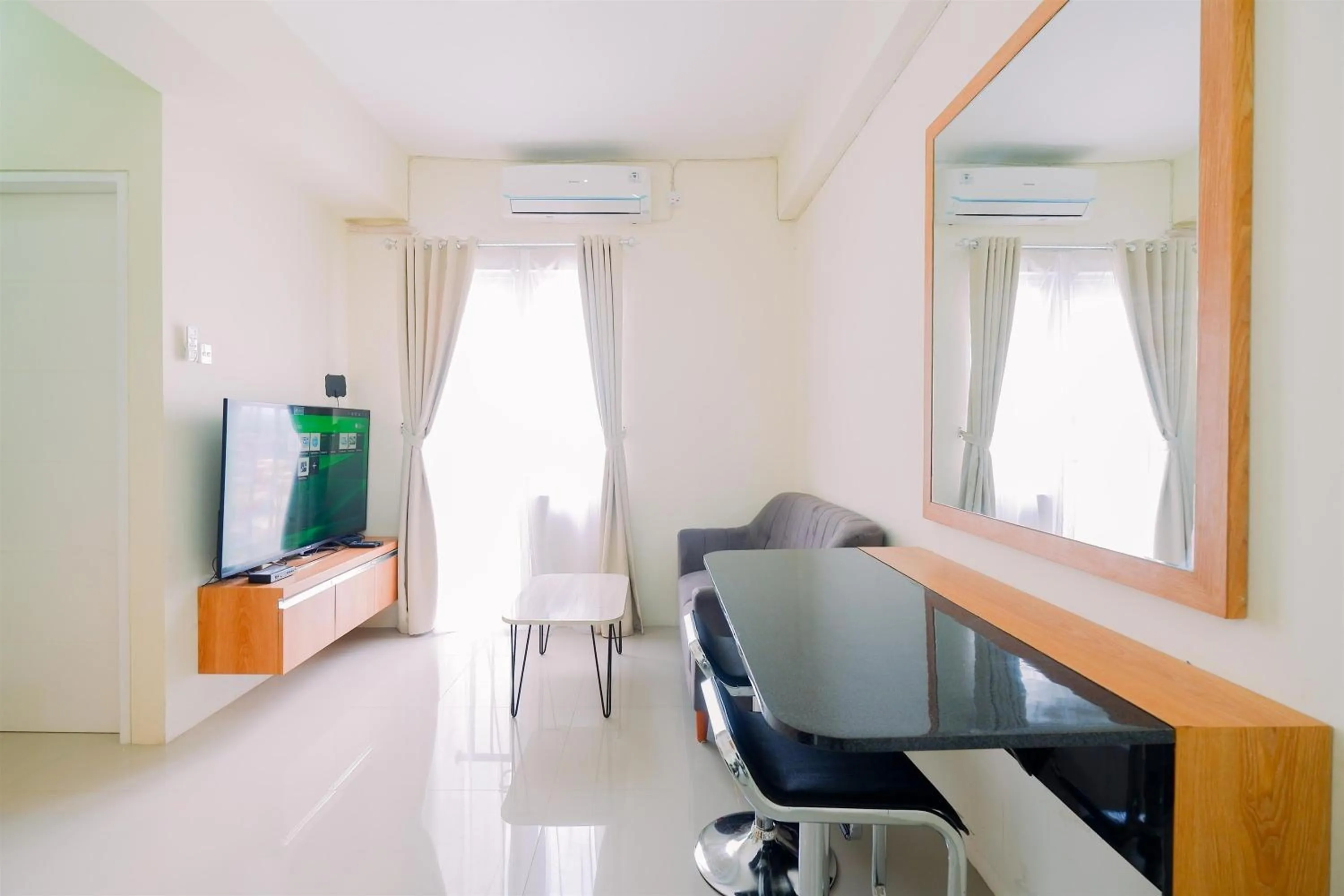 Warm and Cozy Living 2BR Bogorienze Apartment By Travelio