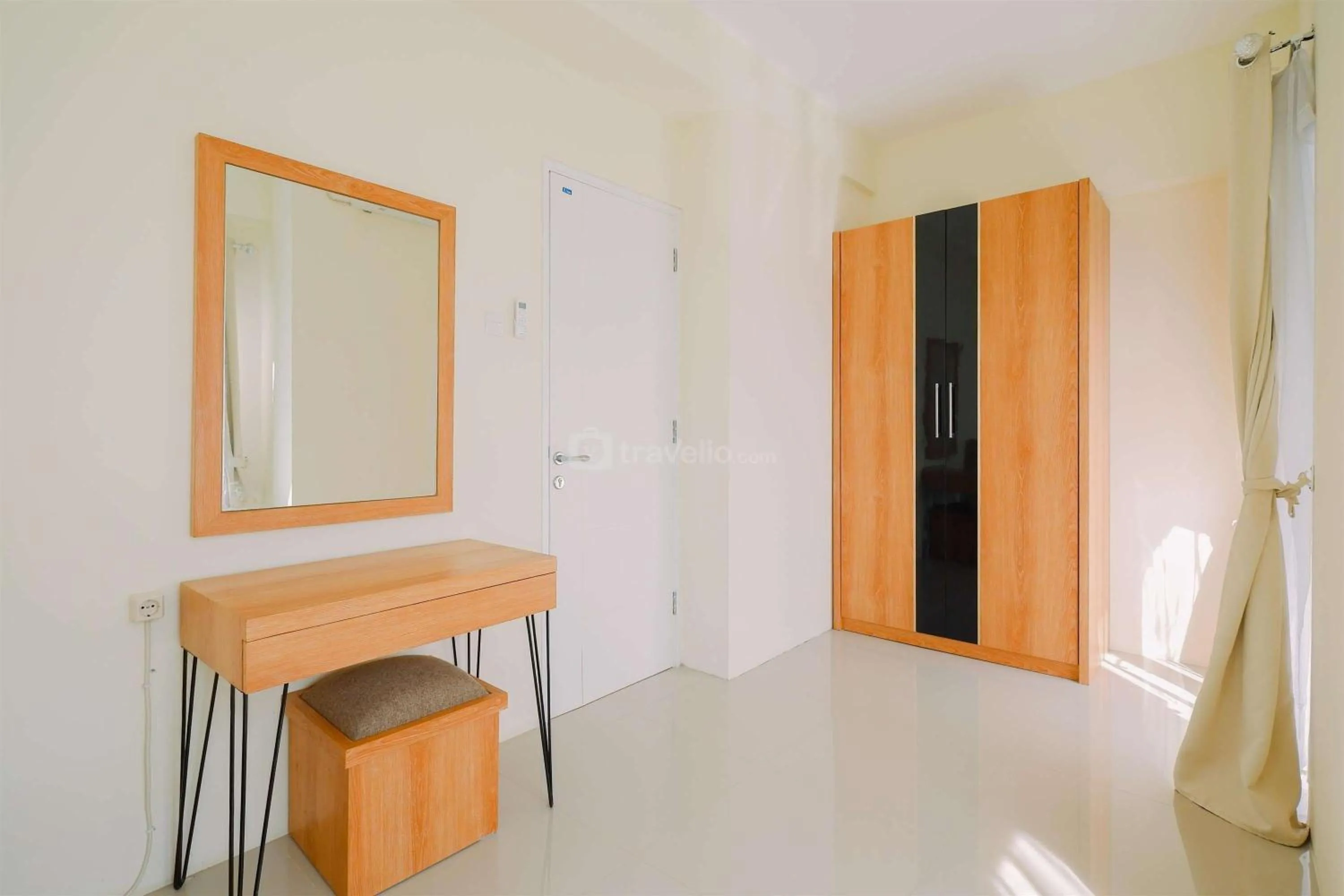 Bed in Warm and Cozy Living 2BR Bogorienze Apartment By Travelio