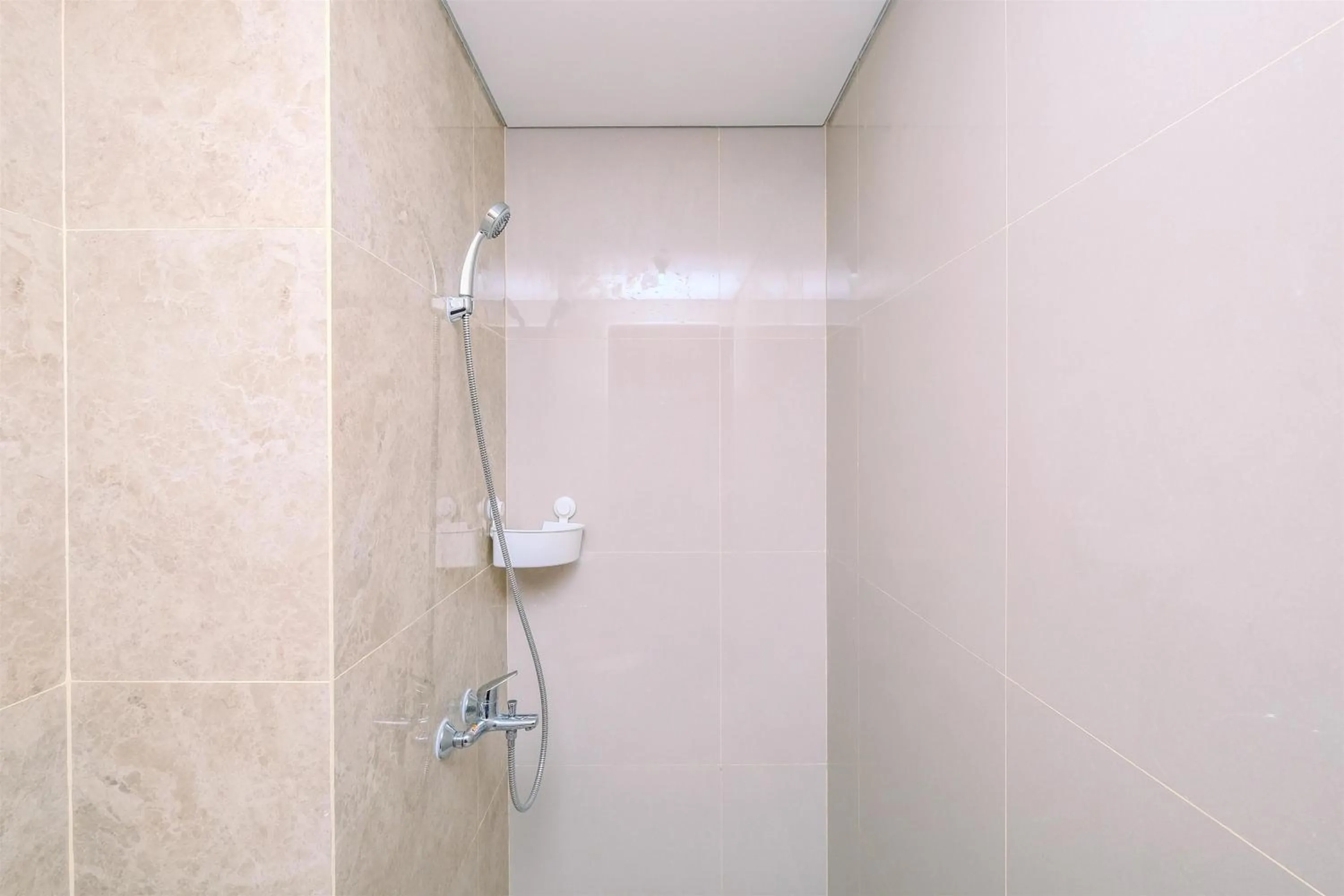 Bathroom in Good Deal 2BR at High Floor Transpark Cibubur Apartment By Travelio