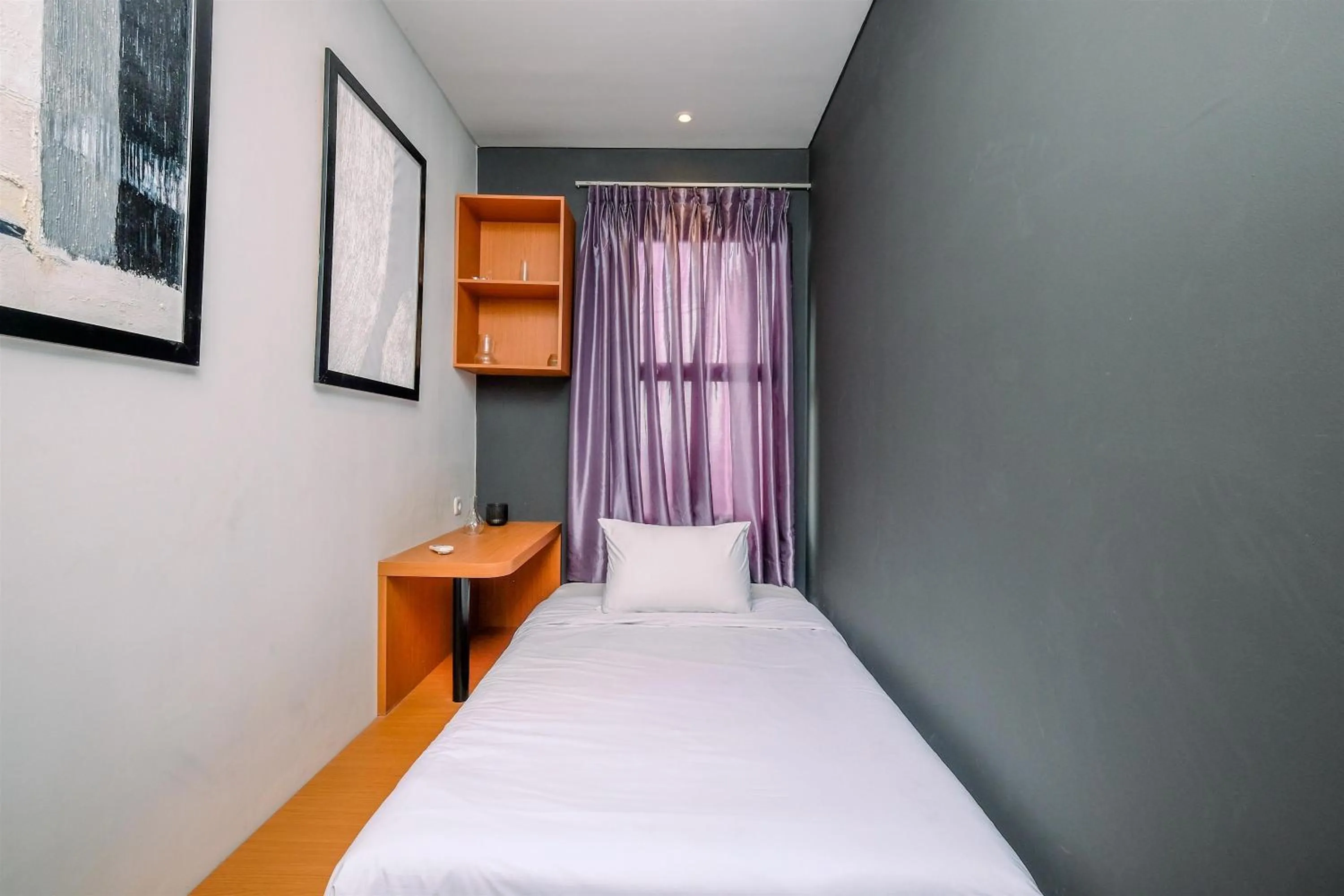 Bed in Good Deal 2BR at High Floor Transpark Cibubur Apartment By Travelio