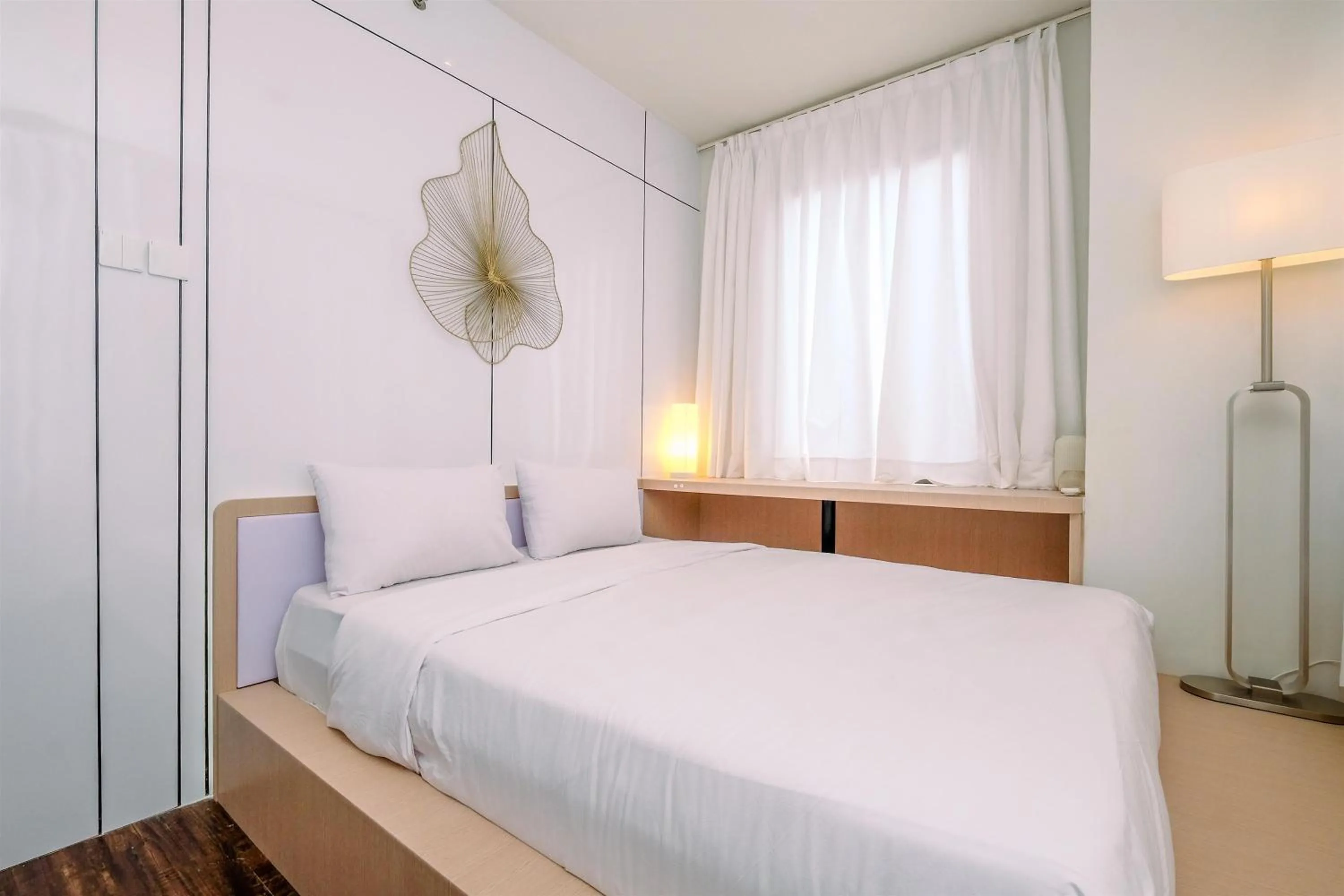 Bed in Good Deal 2BR at High Floor Transpark Cibubur Apartment By Travelio