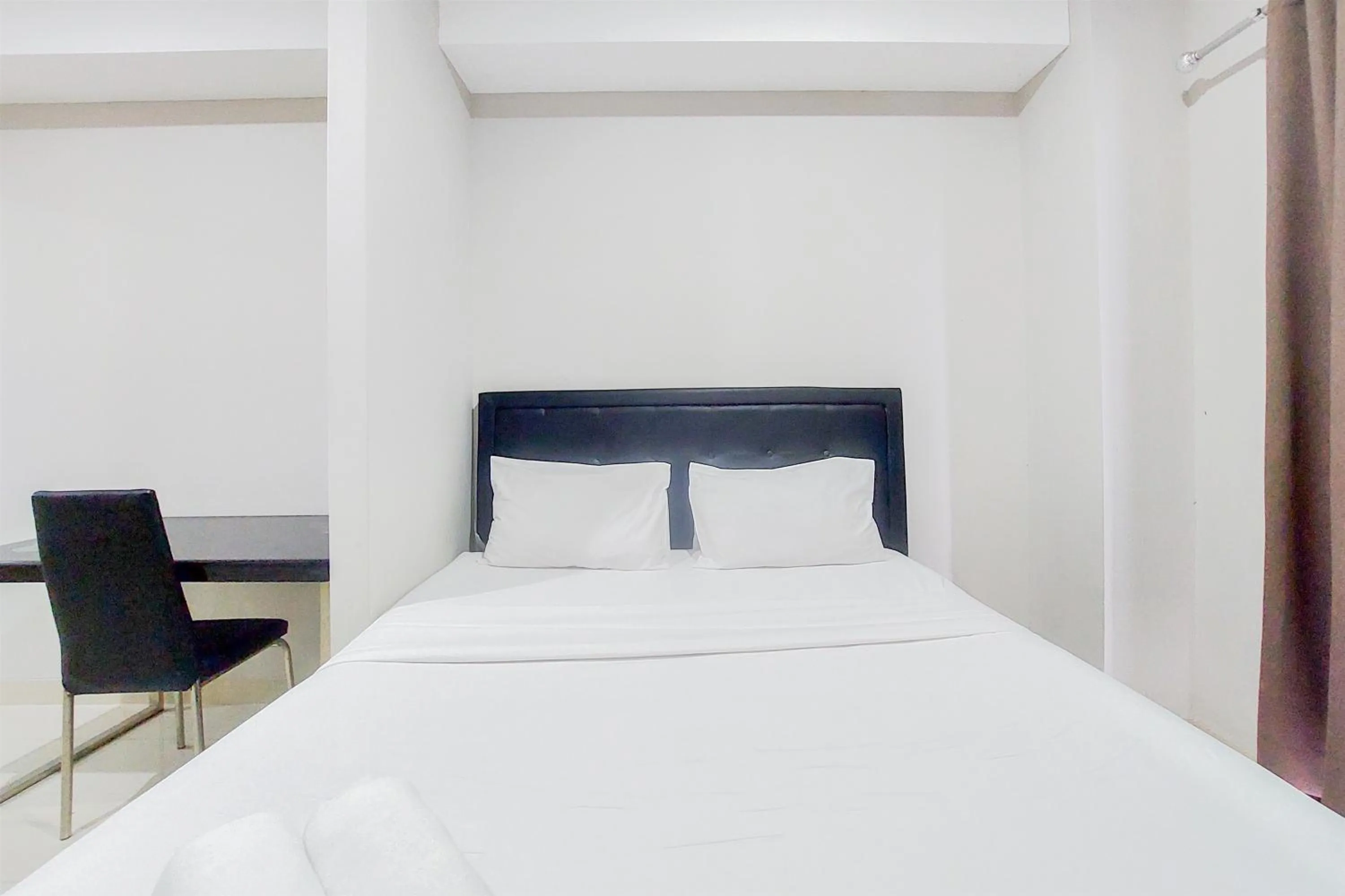 Bed in Comfy and Modern Studio Room The Ayoma Apartment By Travelio