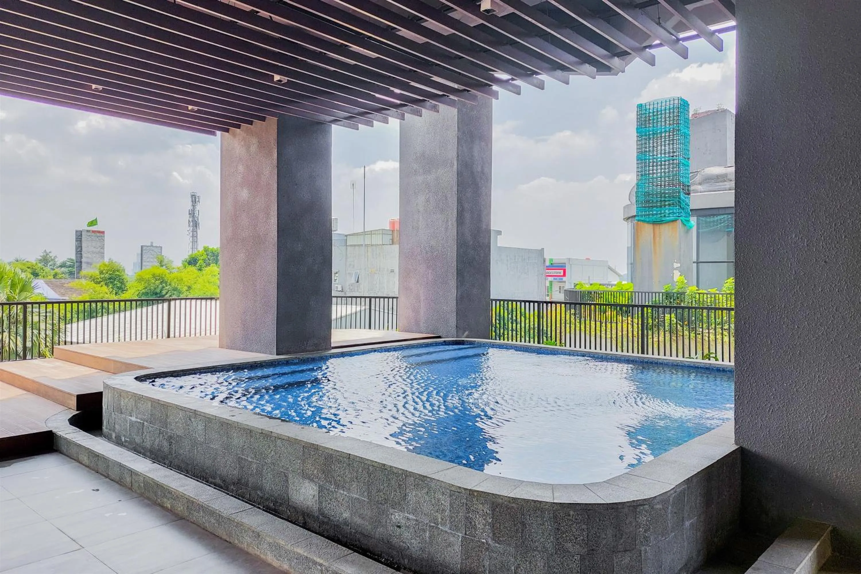 Swimming pool in Comfy and Modern Studio Room The Ayoma Apartment By Travelio