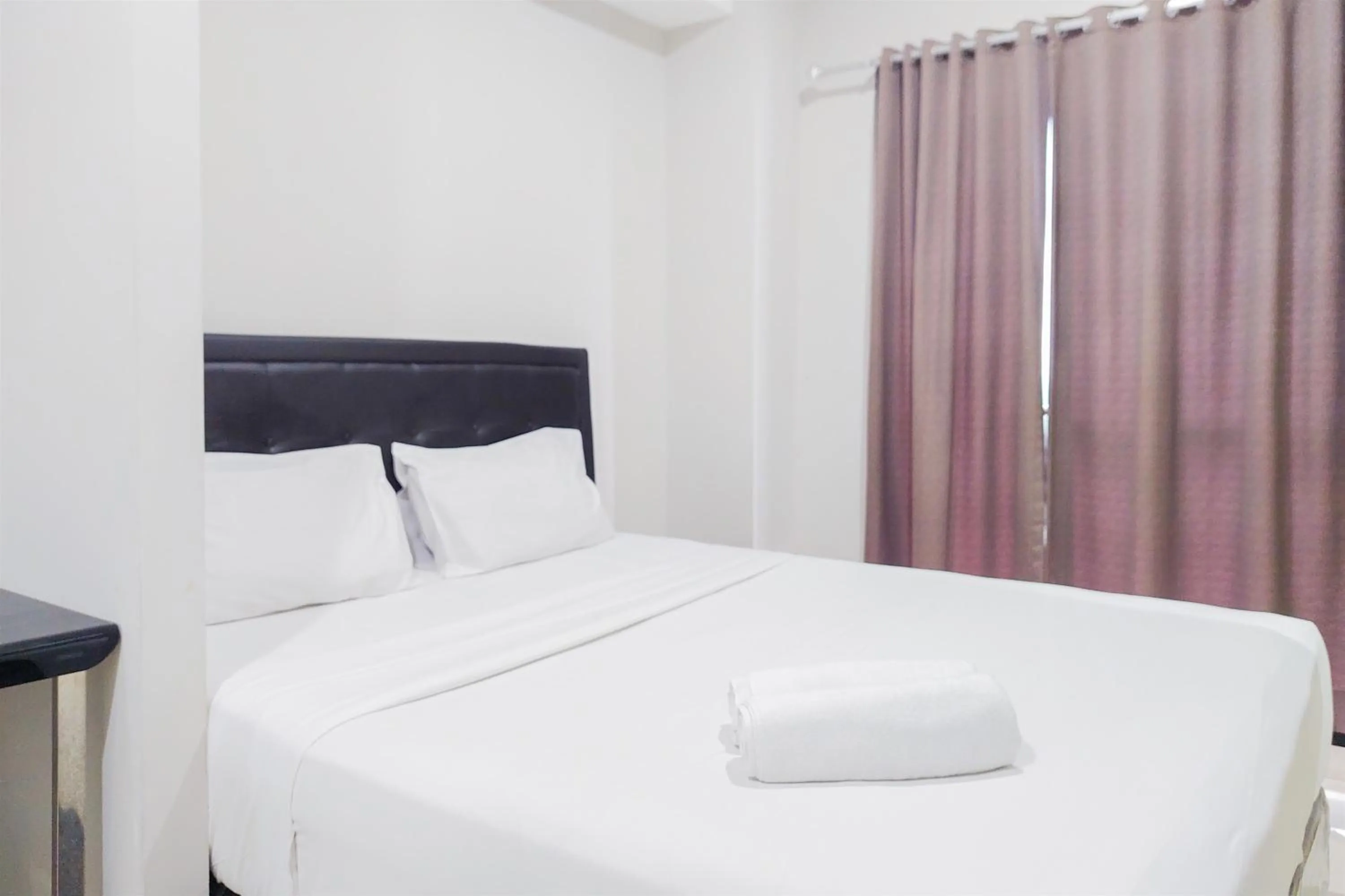 Bed in Comfy and Modern Studio Room The Ayoma Apartment By Travelio