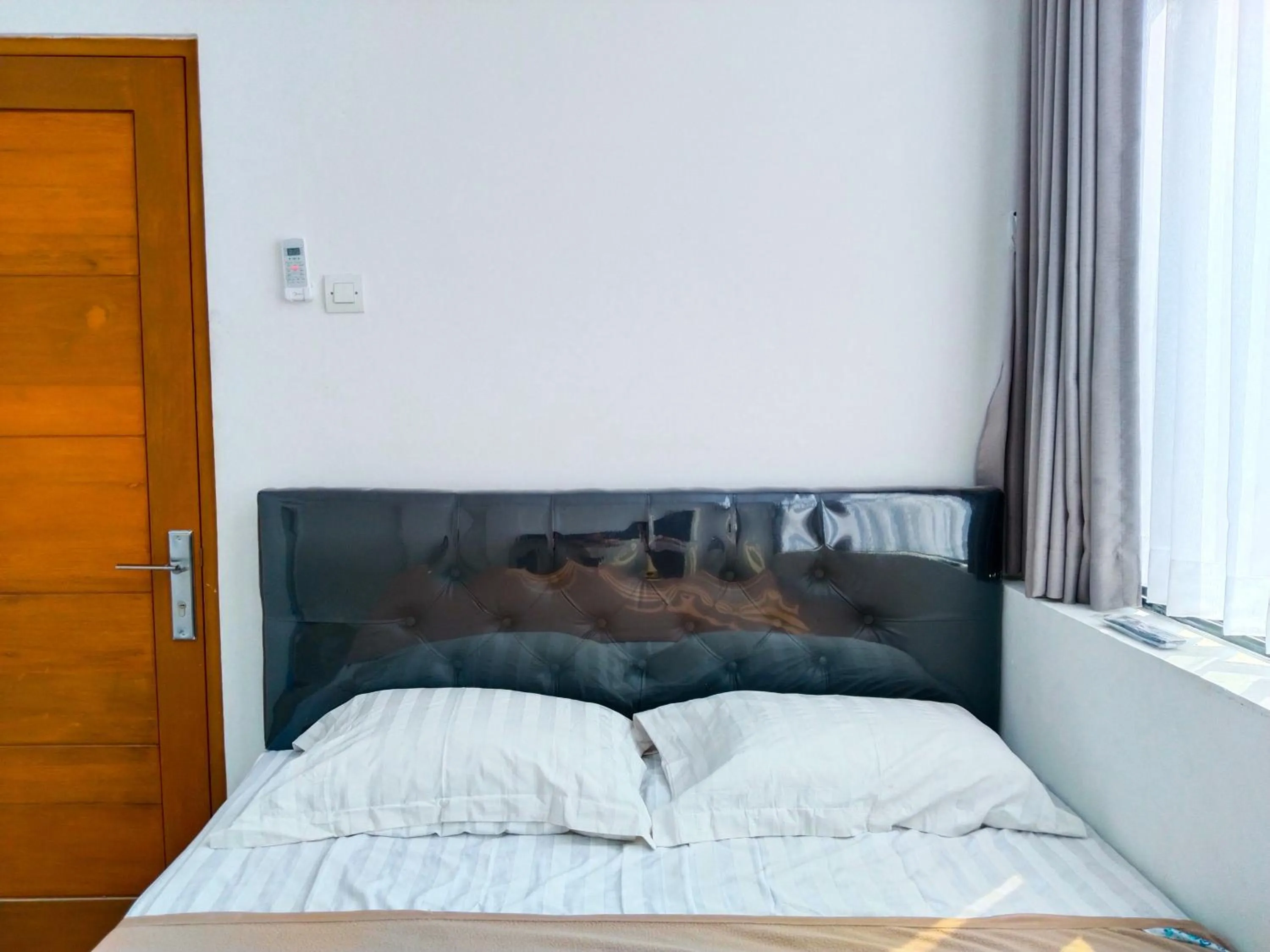 Bed in Themas Guest House