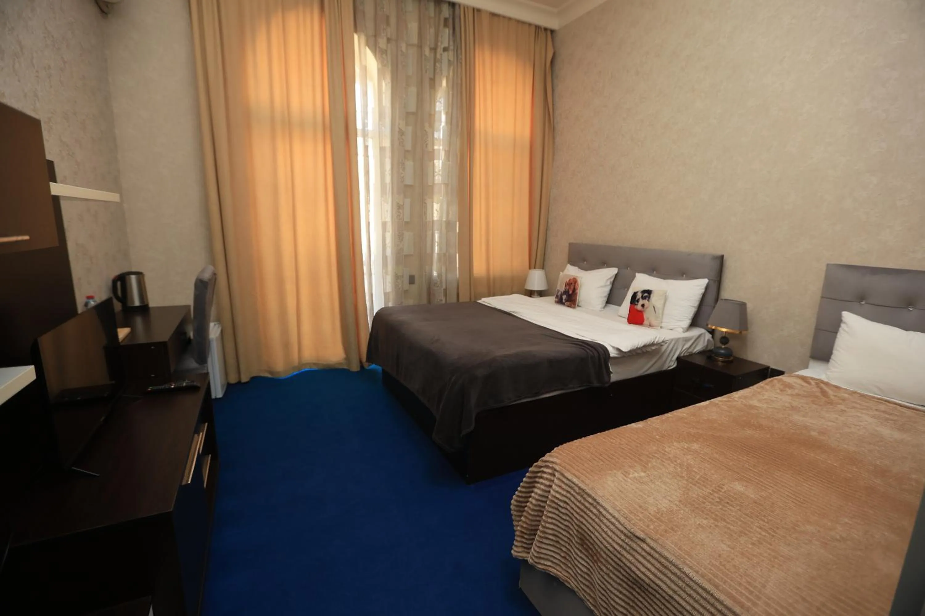 Bed in NH Nizami Hotel