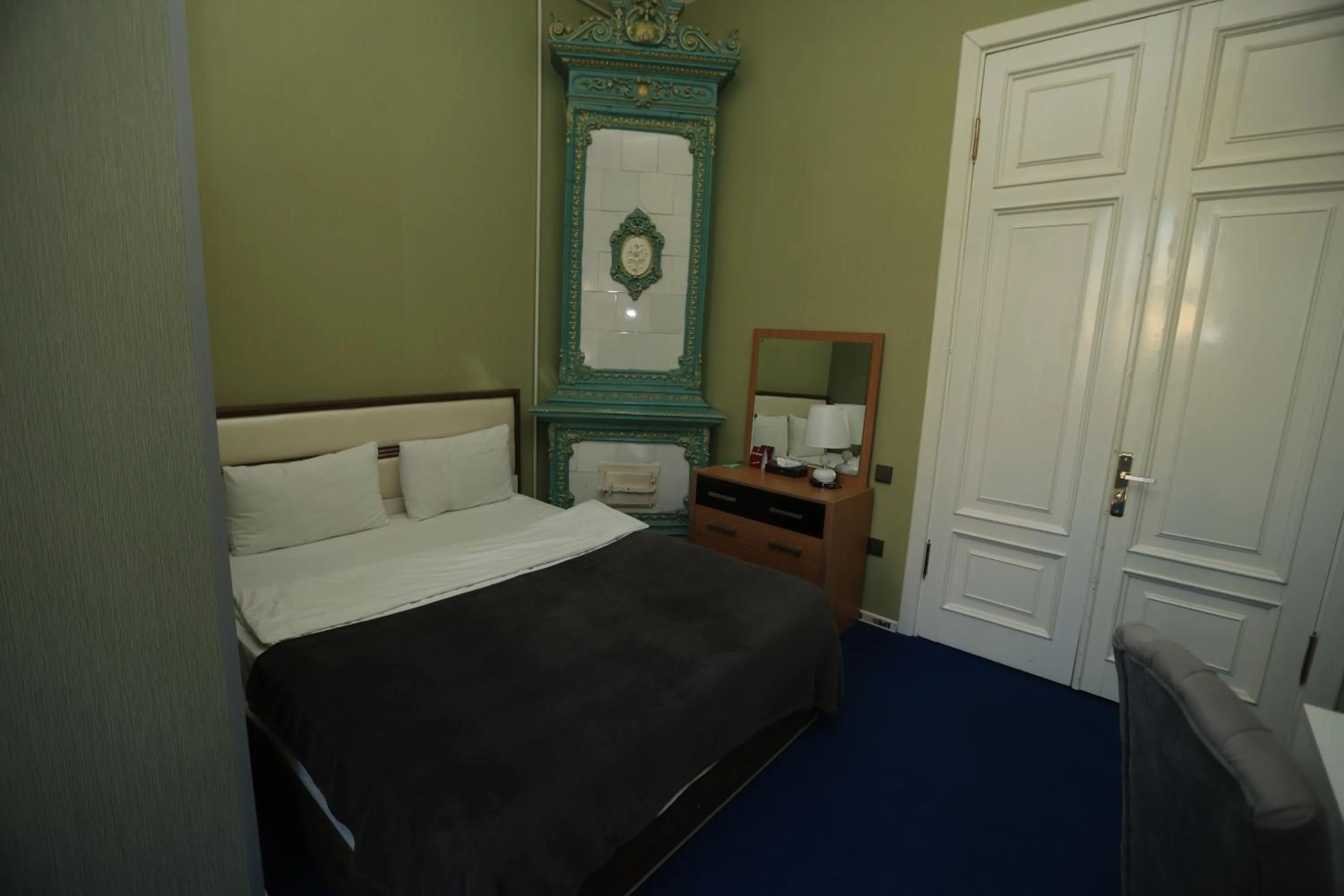 Bed in NH Nizami Hotel