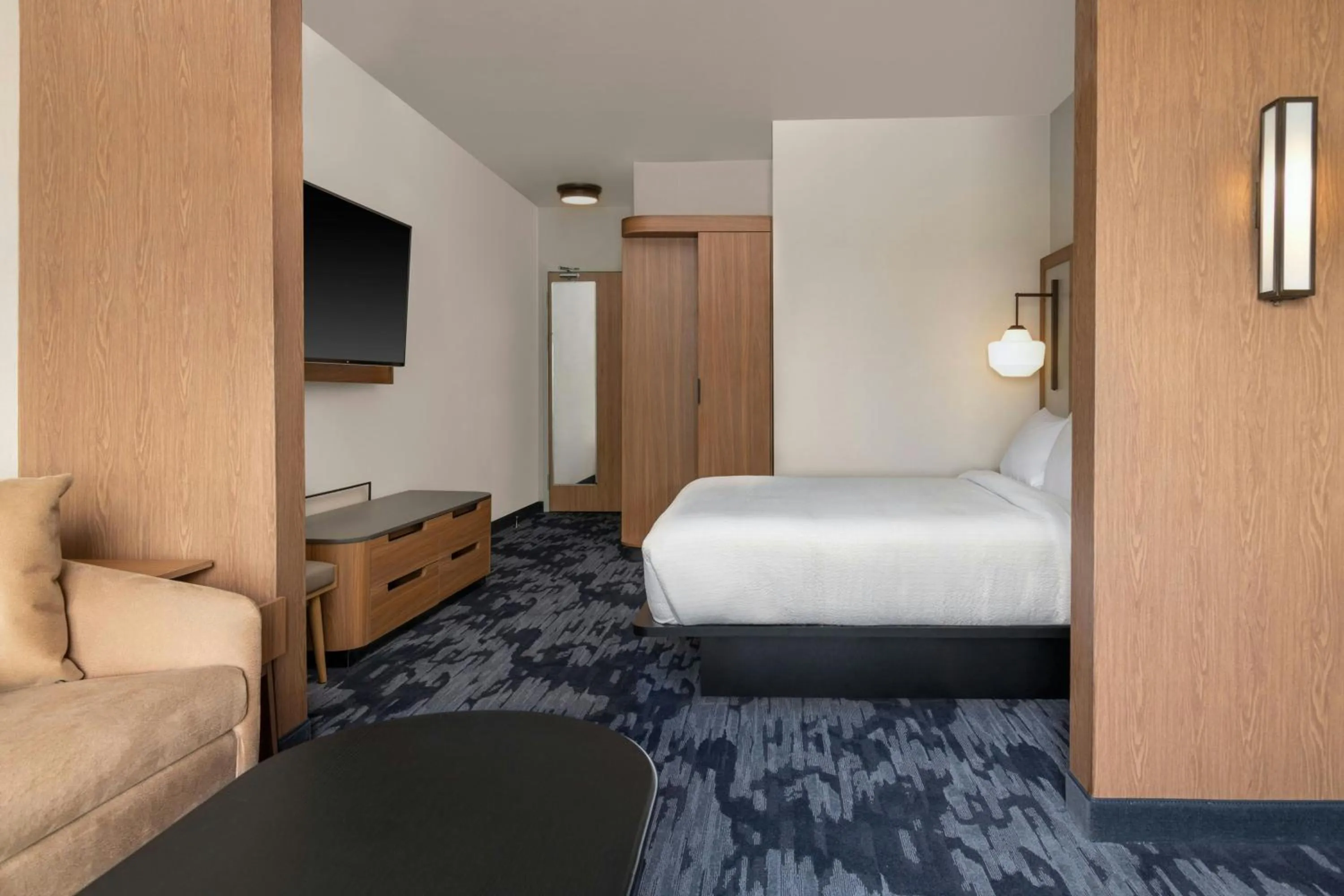 Photo of the whole room, Bed in Fairfield by Marriott Inn & Suites Kansas City at The Legends