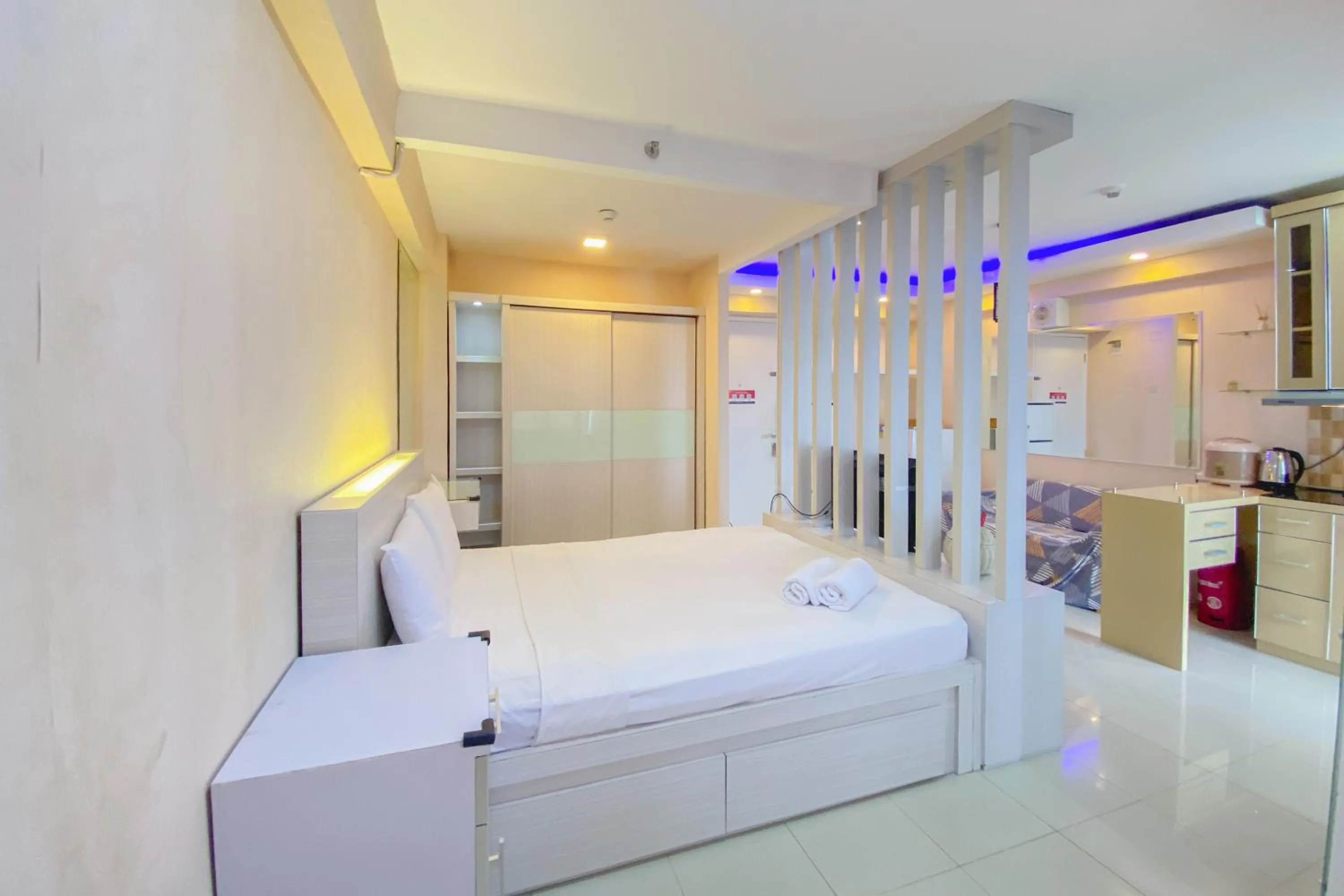 Bed in Best Deal and Spacious Studio at Bassura City Apartment By Travelio