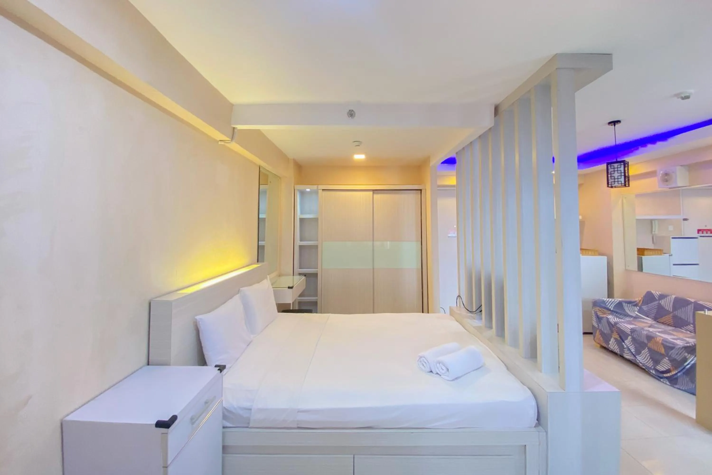 Bed in Best Deal and Spacious Studio at Bassura City Apartment By Travelio