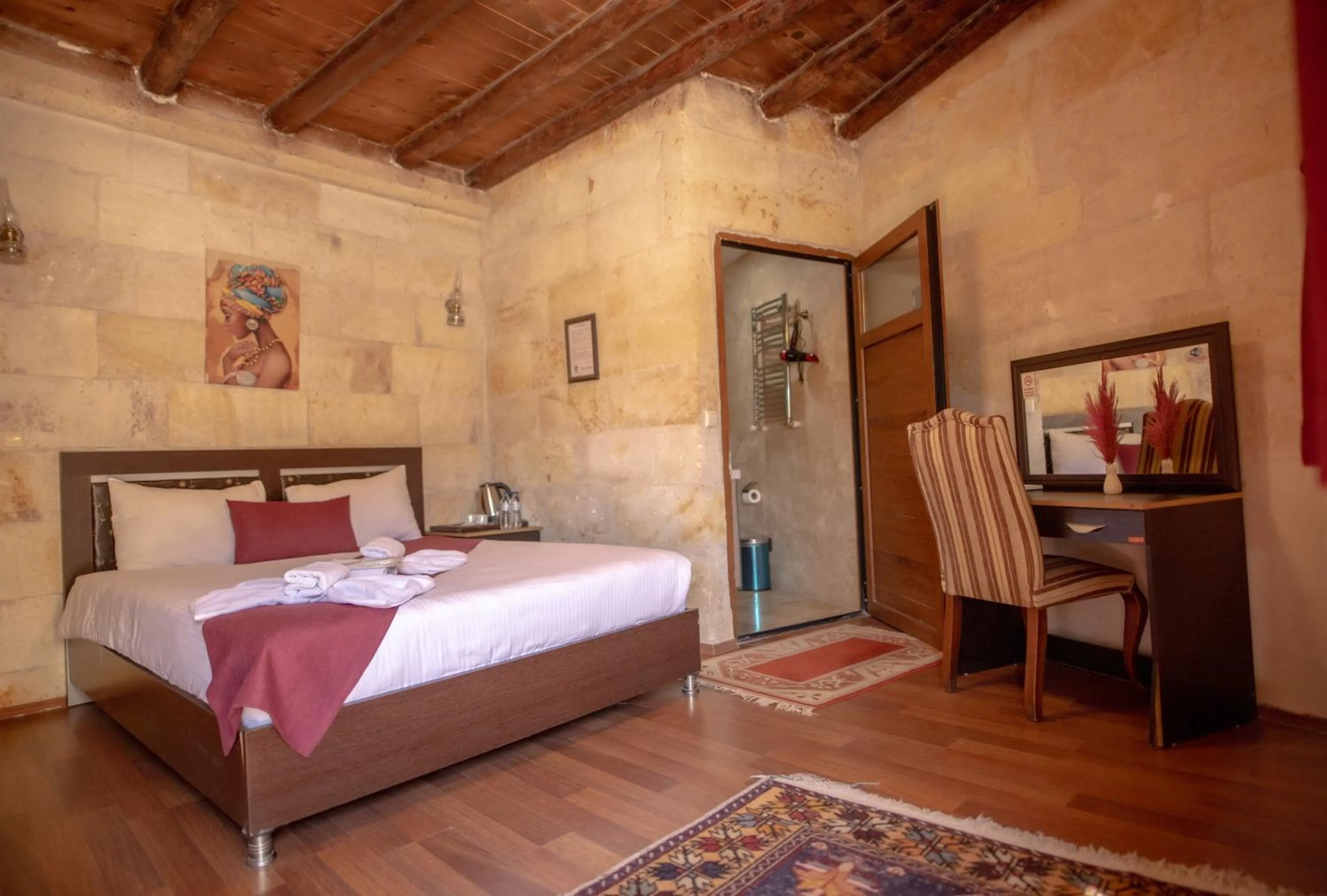 Photo of the whole room, Bed in Güven Cave Hotel