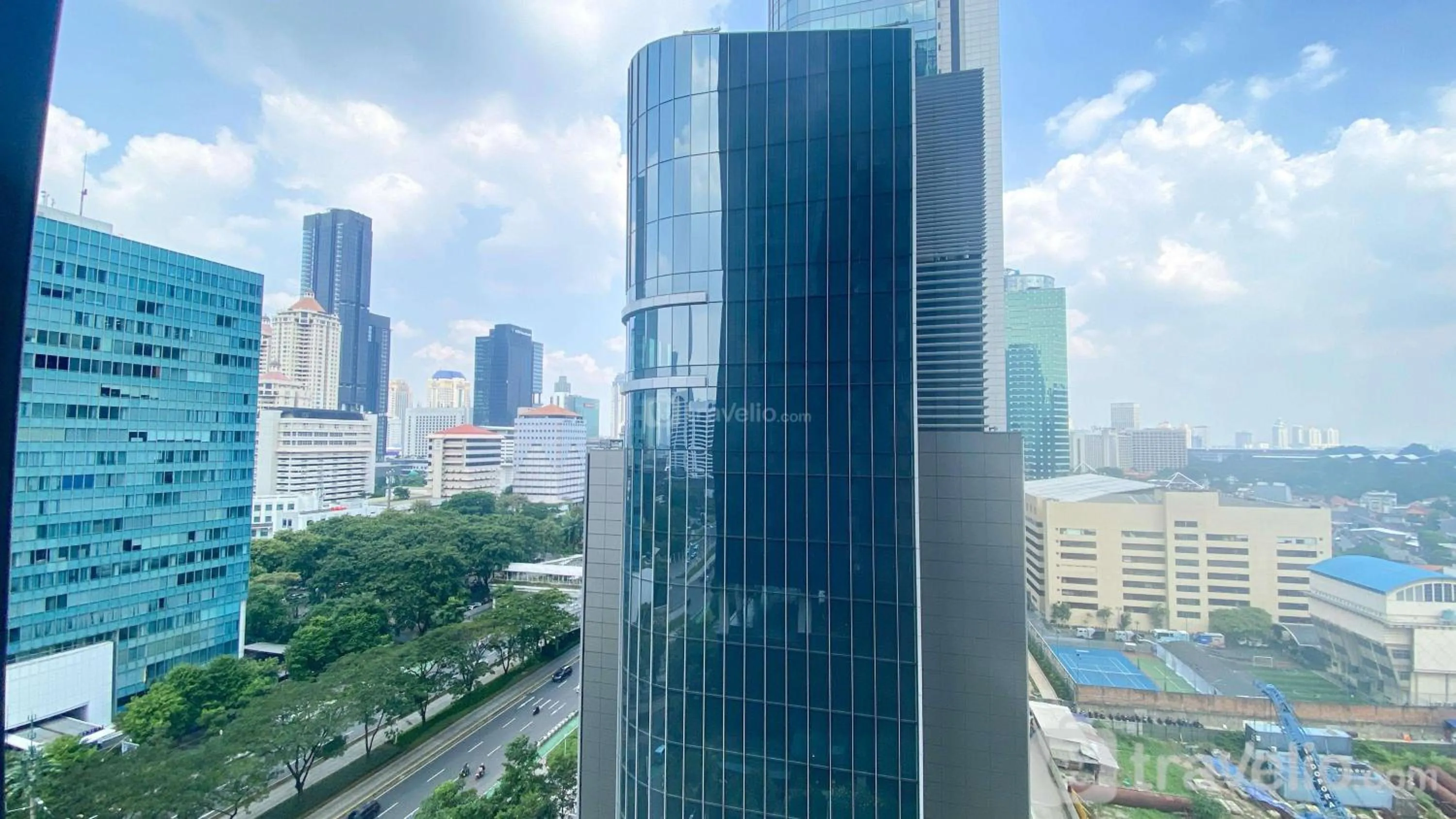 Property building in Comfort and Elegant 2BR Sudirman Suites Apartment By Travelio