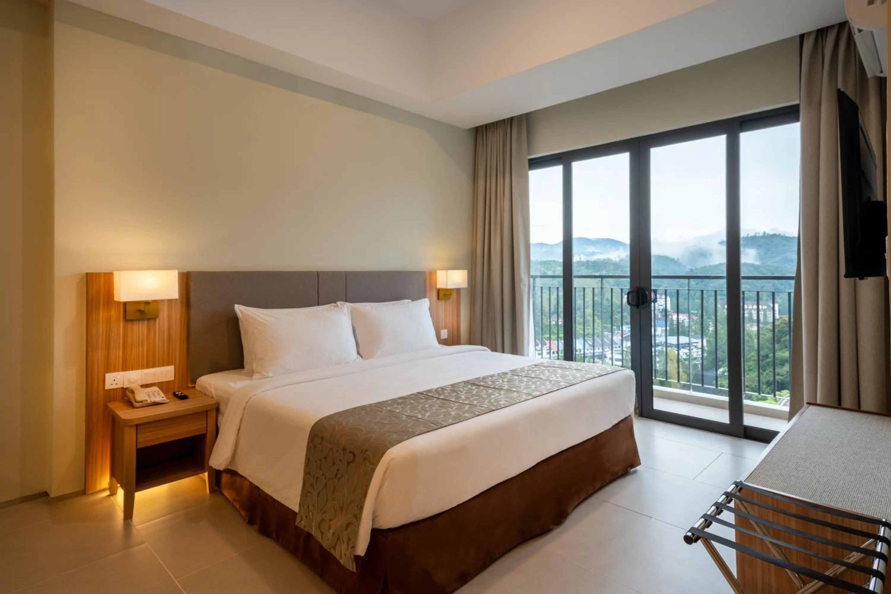 Bed in Zenith Suites Cameron