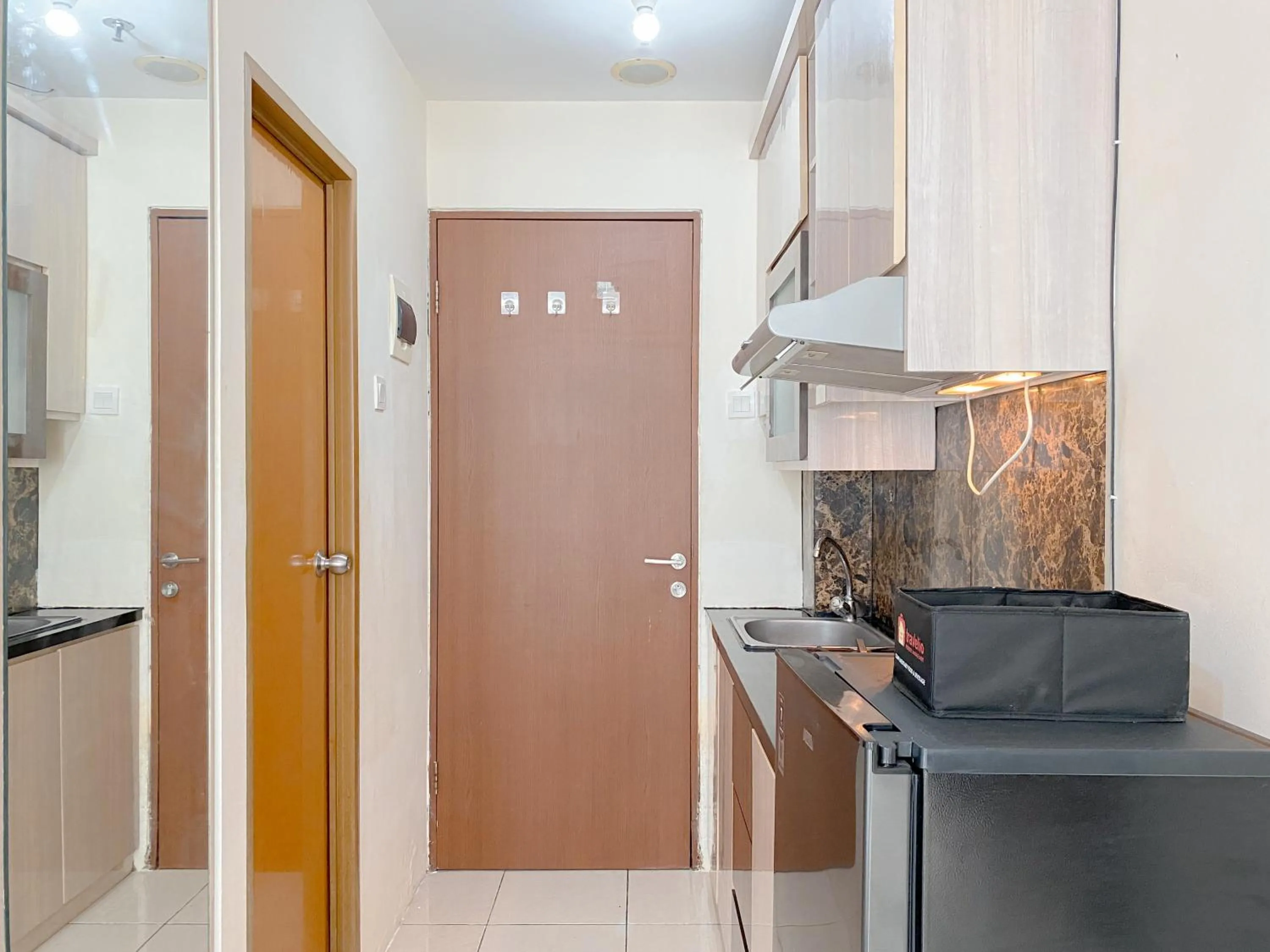 Modern Look and Comfy Studio Tifolia Apartment By Travelio