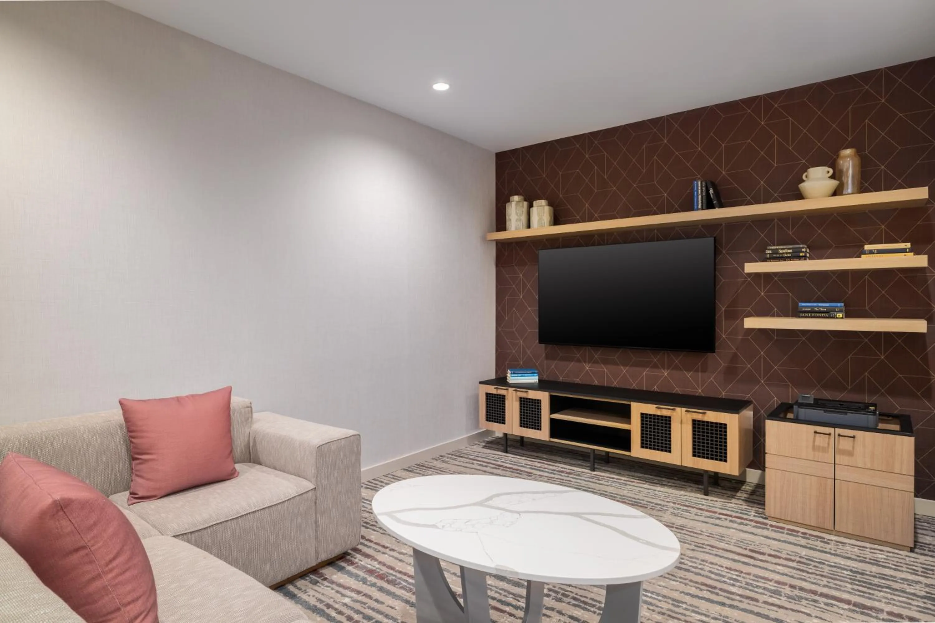 Communal lounge/ TV room in Homewood Suites By Hilton Thornton Denver