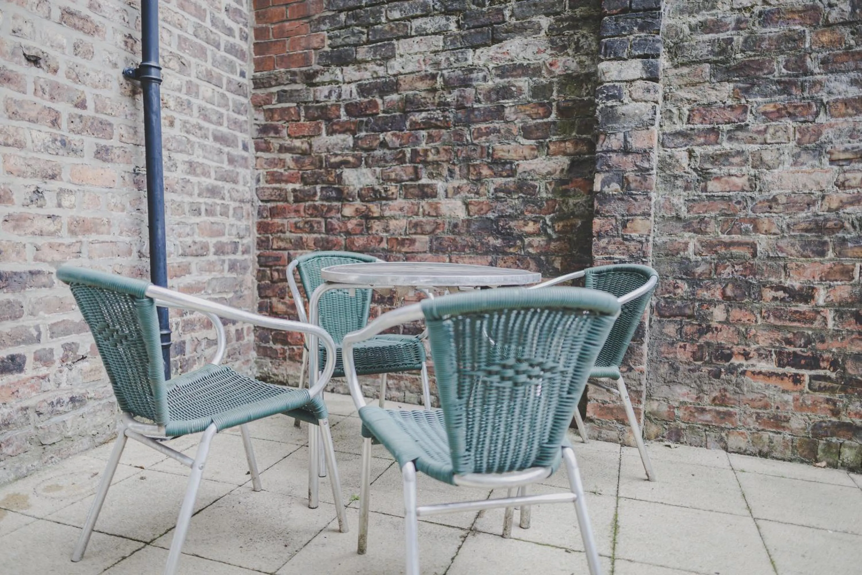 Patio in Kensington House by Warren Collection