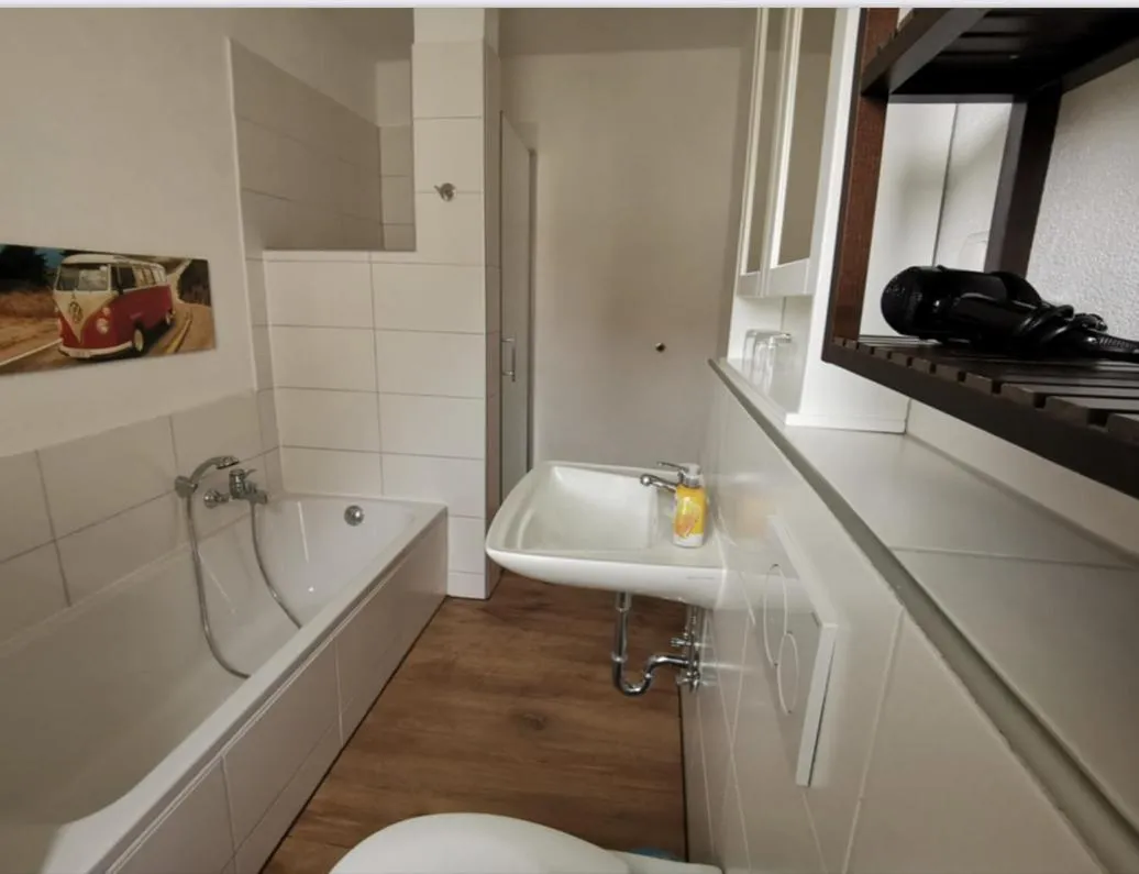 Bathroom in Hotel Wettlaufer - 3 Sterne S - sky -