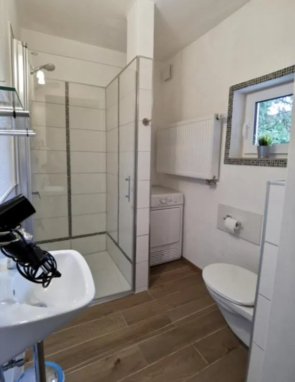 Bathroom in Hotel Wettlaufer - 3 Sterne S - sky -