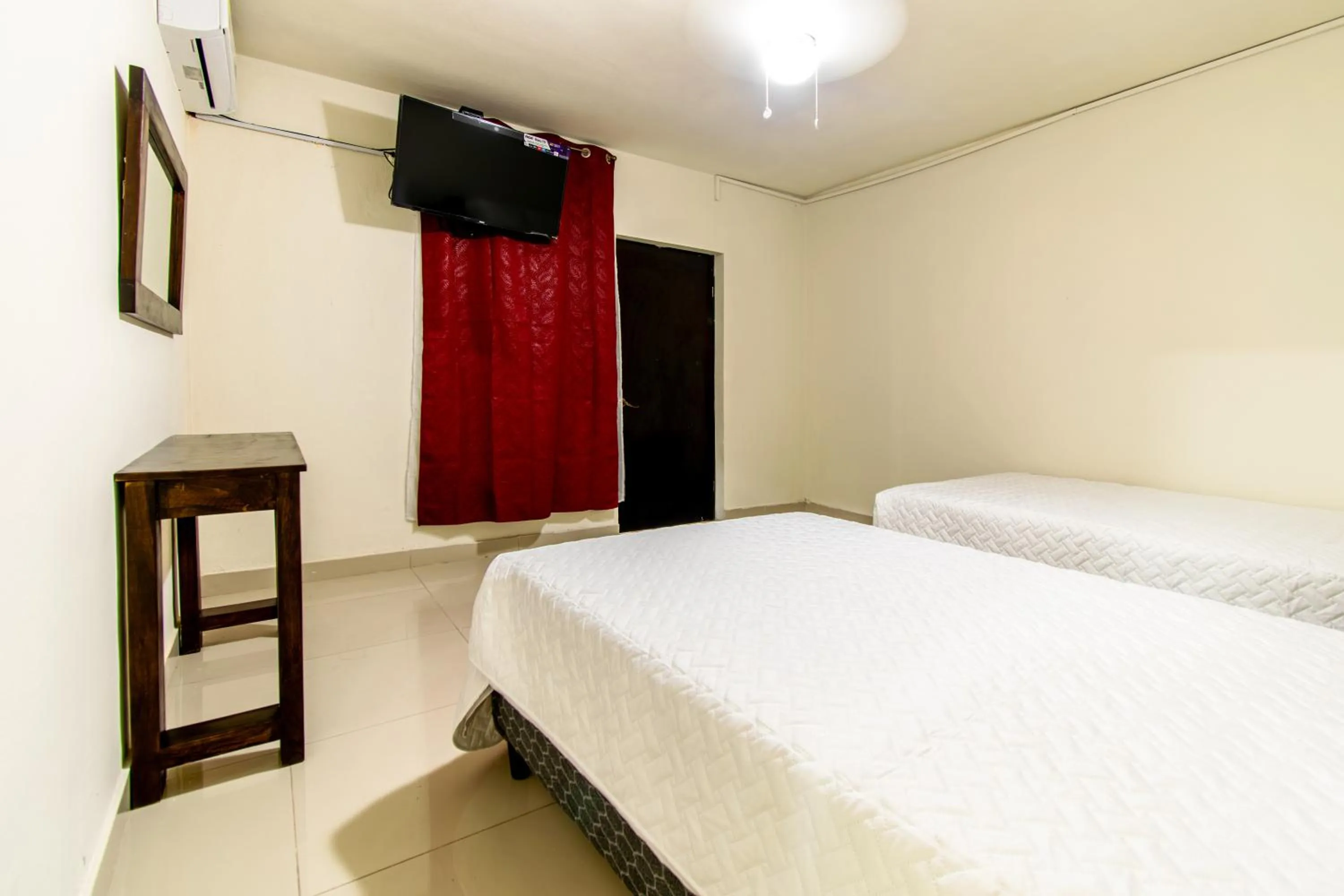 Bed in Lorenzo Hotel