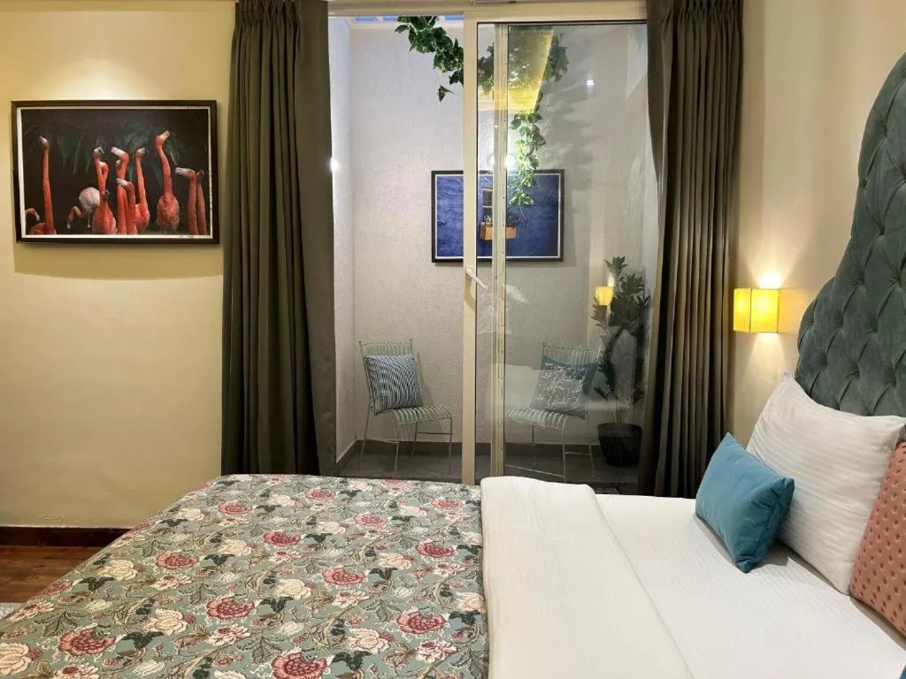 Bed in Gulmohar Mansion - A Boutique Stay