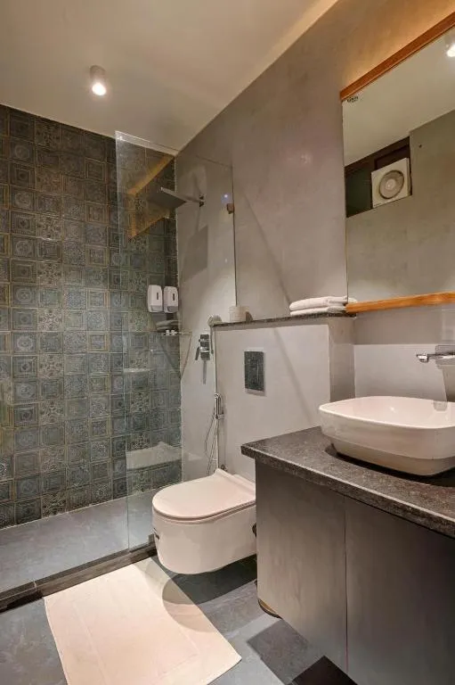 Shower in Gulmohar Mansion - A Boutique Stay
