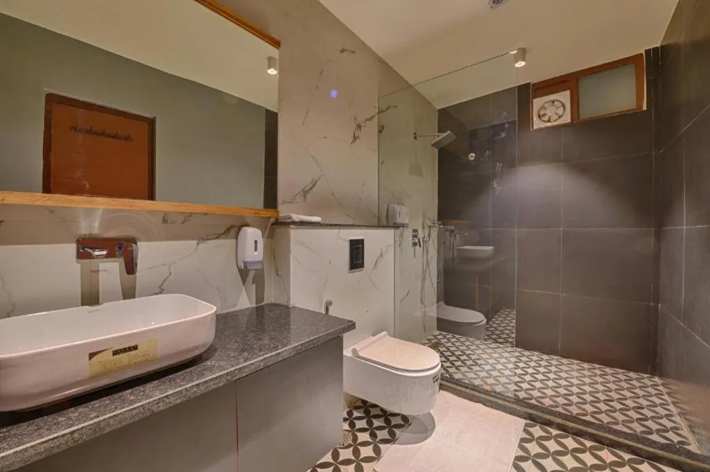 Shower in Gulmohar Mansion - A Boutique Stay