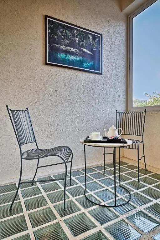 Seating area in Gulmohar Mansion - A Boutique Stay