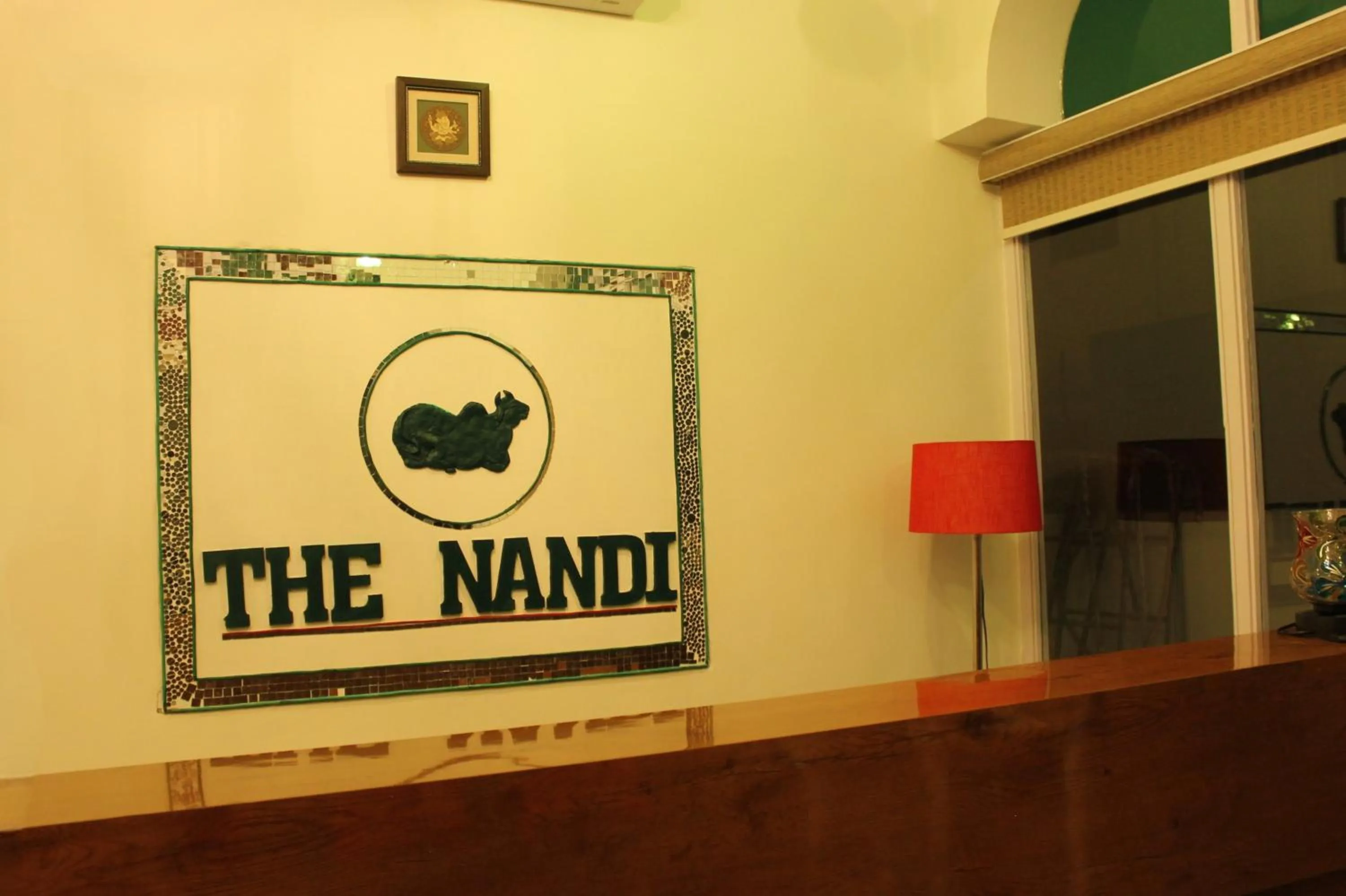 Property logo or sign in The Nandi International Boutique Stay