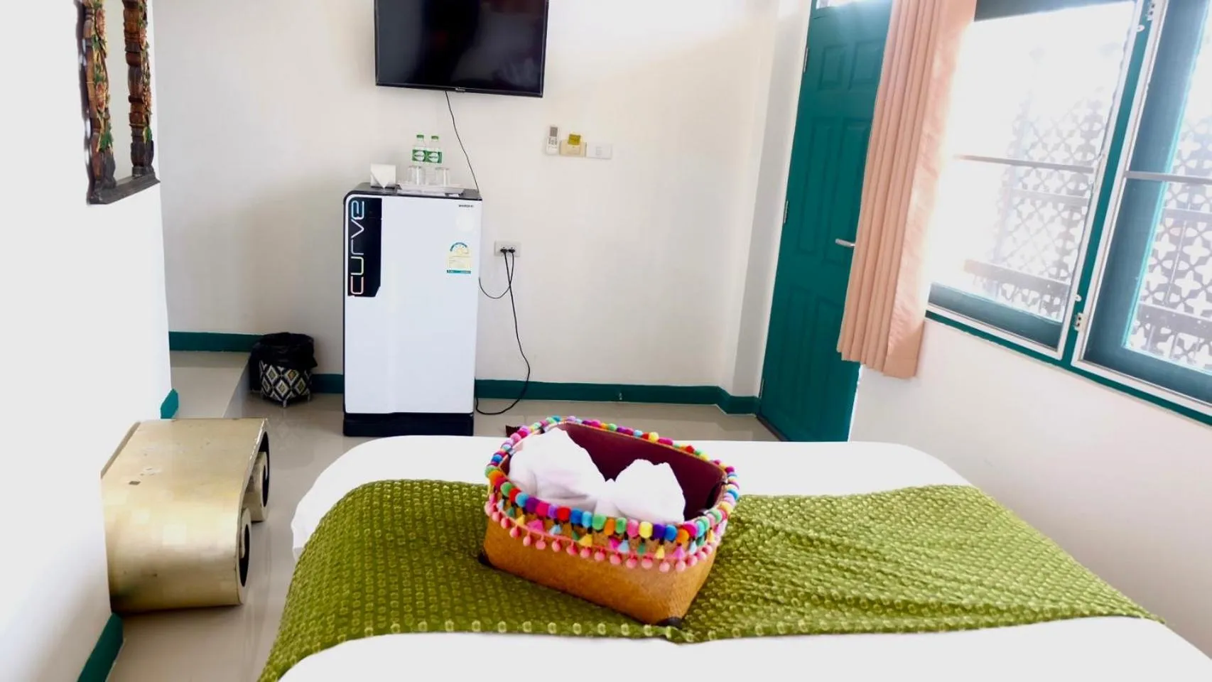 Bed in Yellow Lamoon Hotel