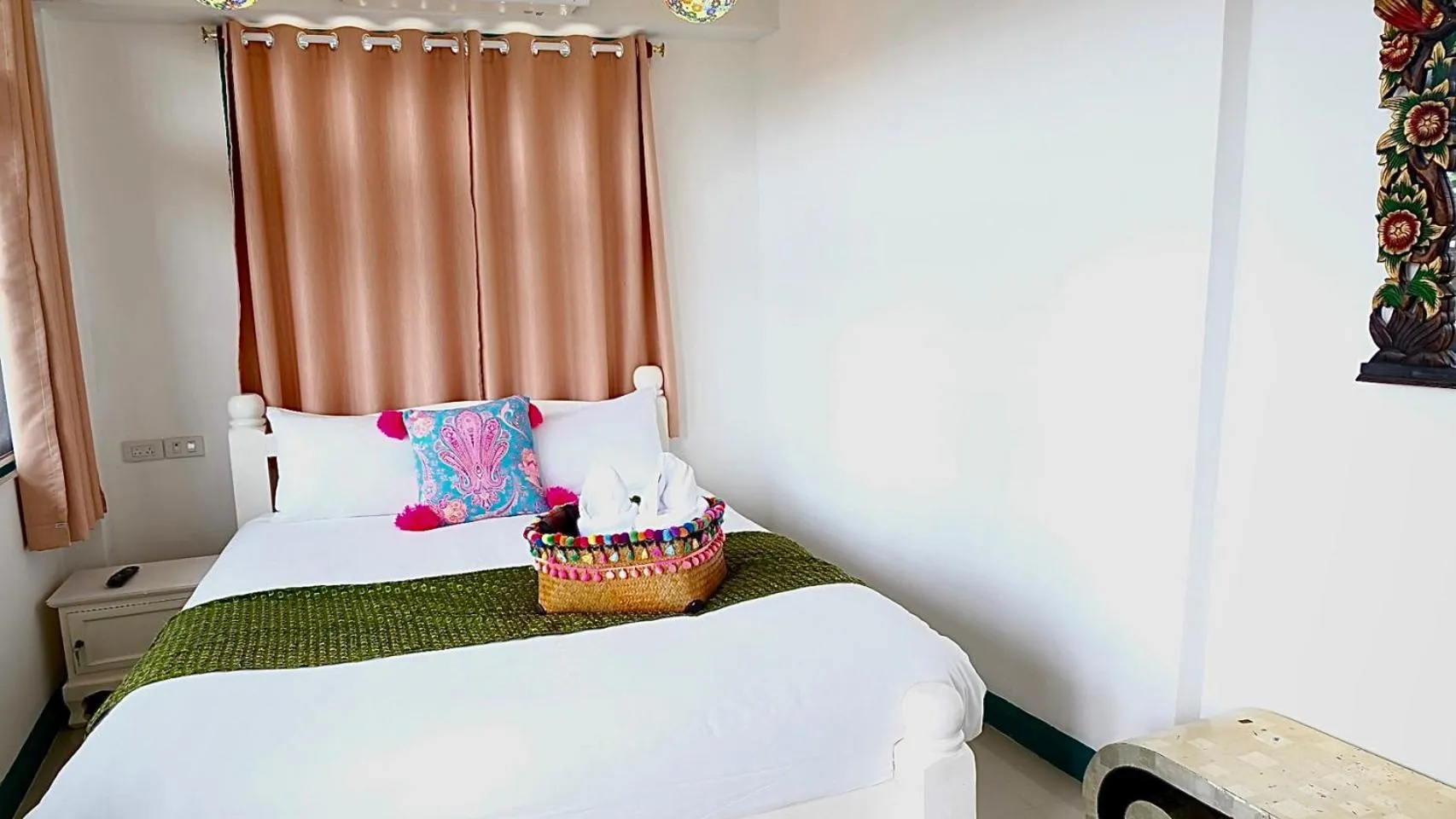 Bed in Yellow Lamoon Hotel