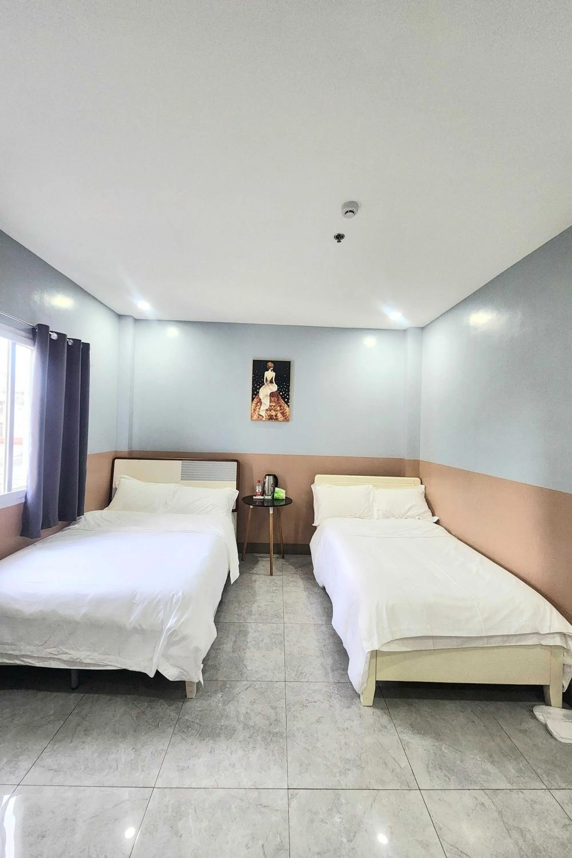 Bed in Qingqing Hotel Pasay Manila near MOA