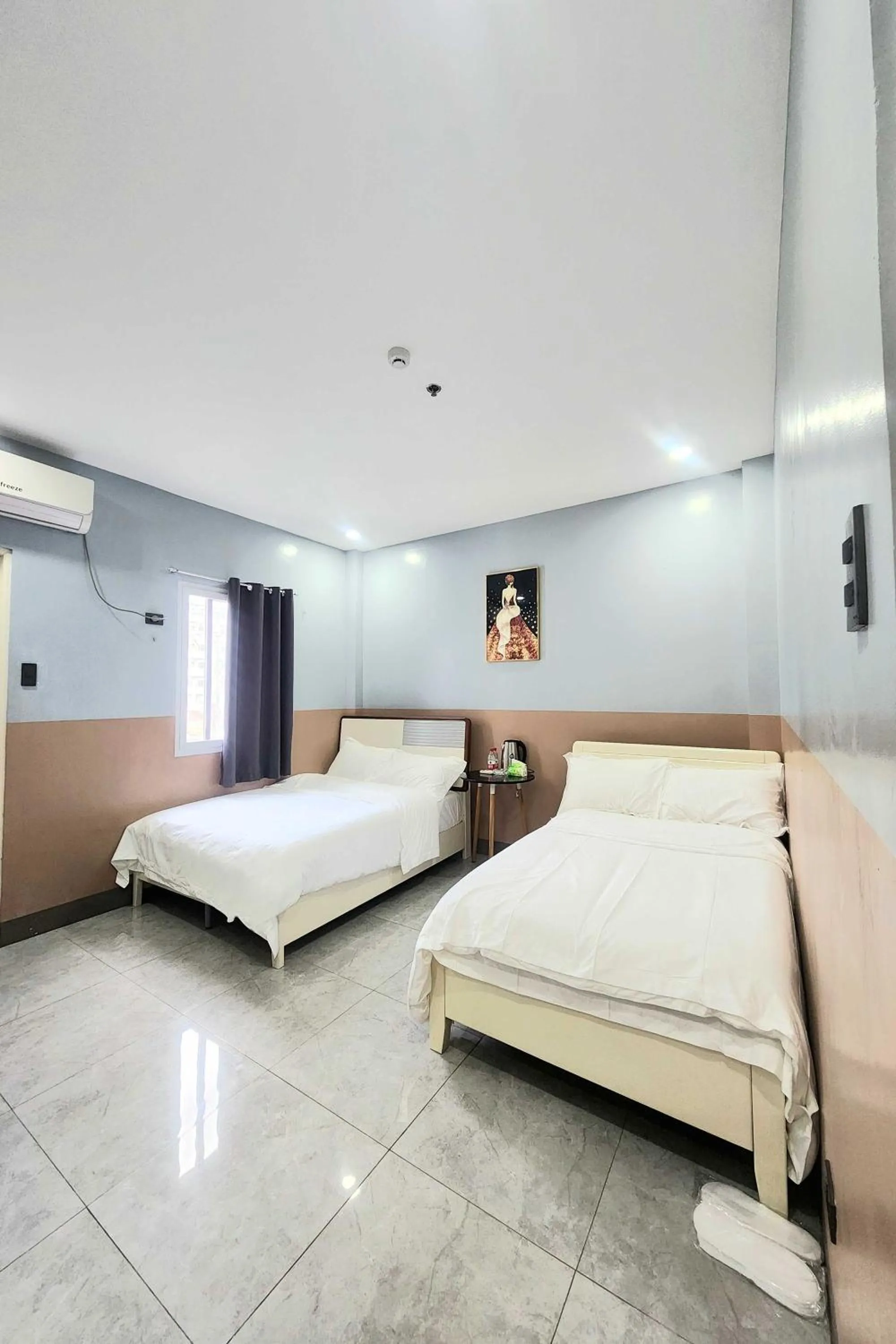 Bed in Qingqing Hotel Pasay Manila near MOA