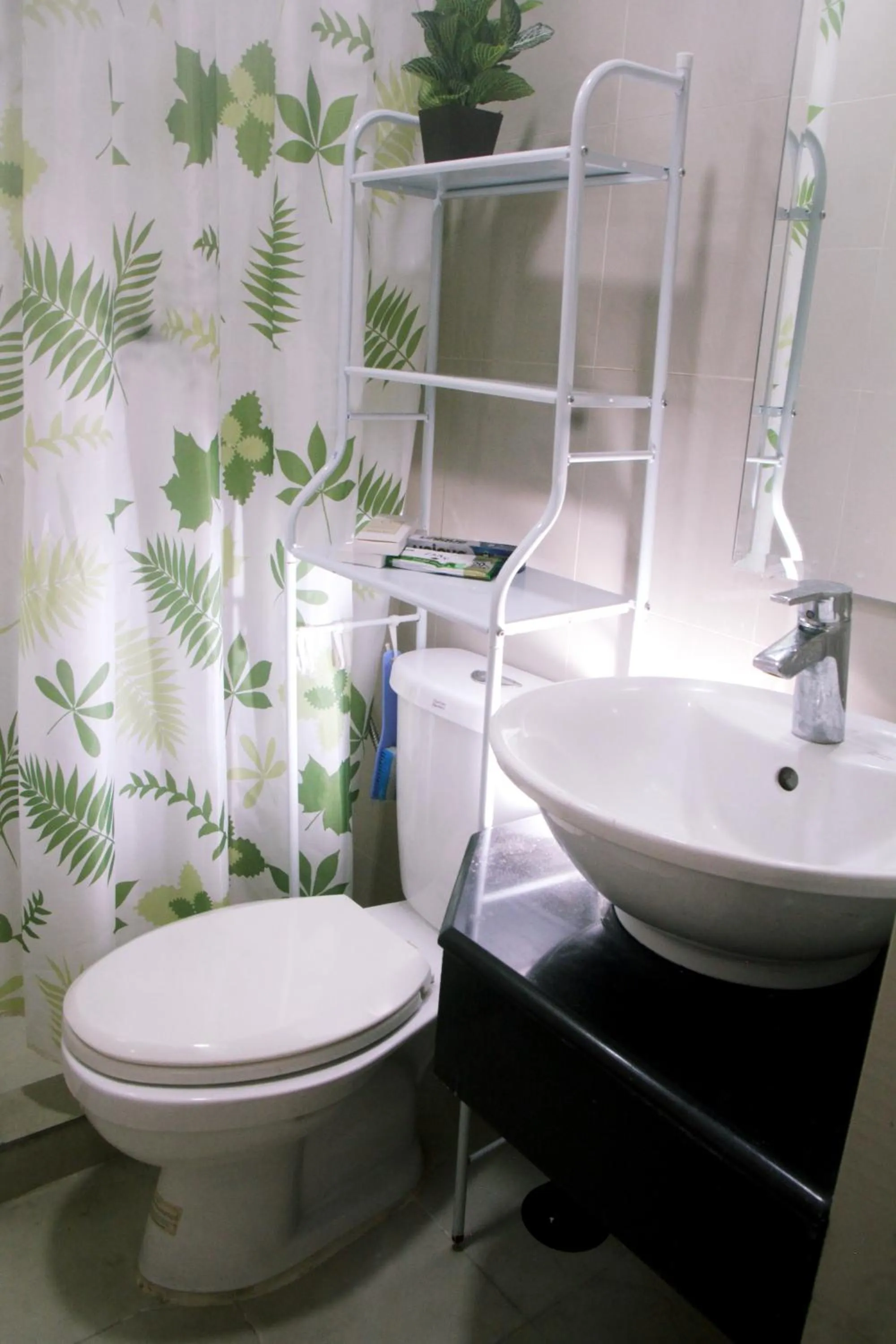 Bathroom in Cozy Pad in Cubao