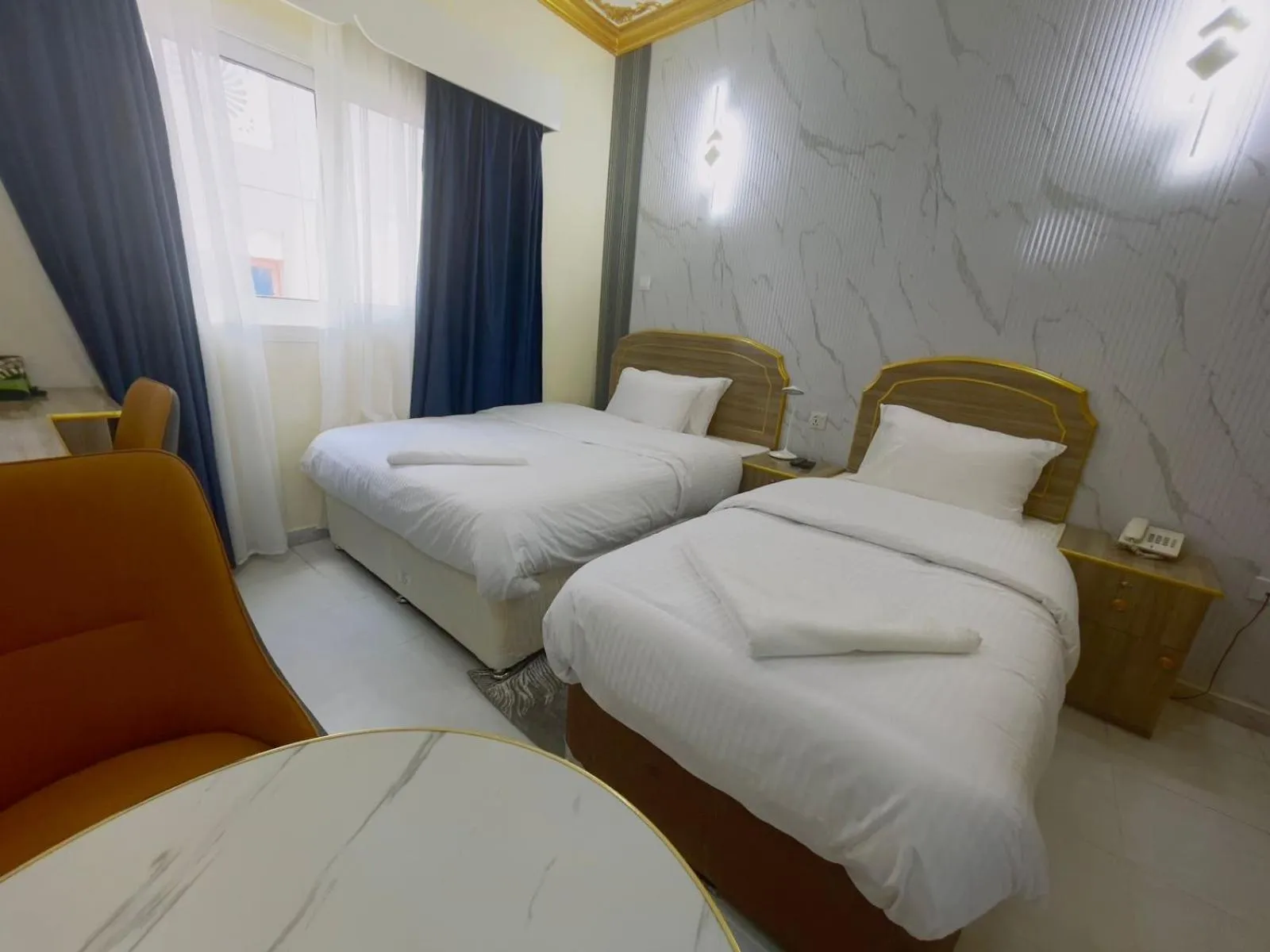 Bed in Galaxy Star Hotel