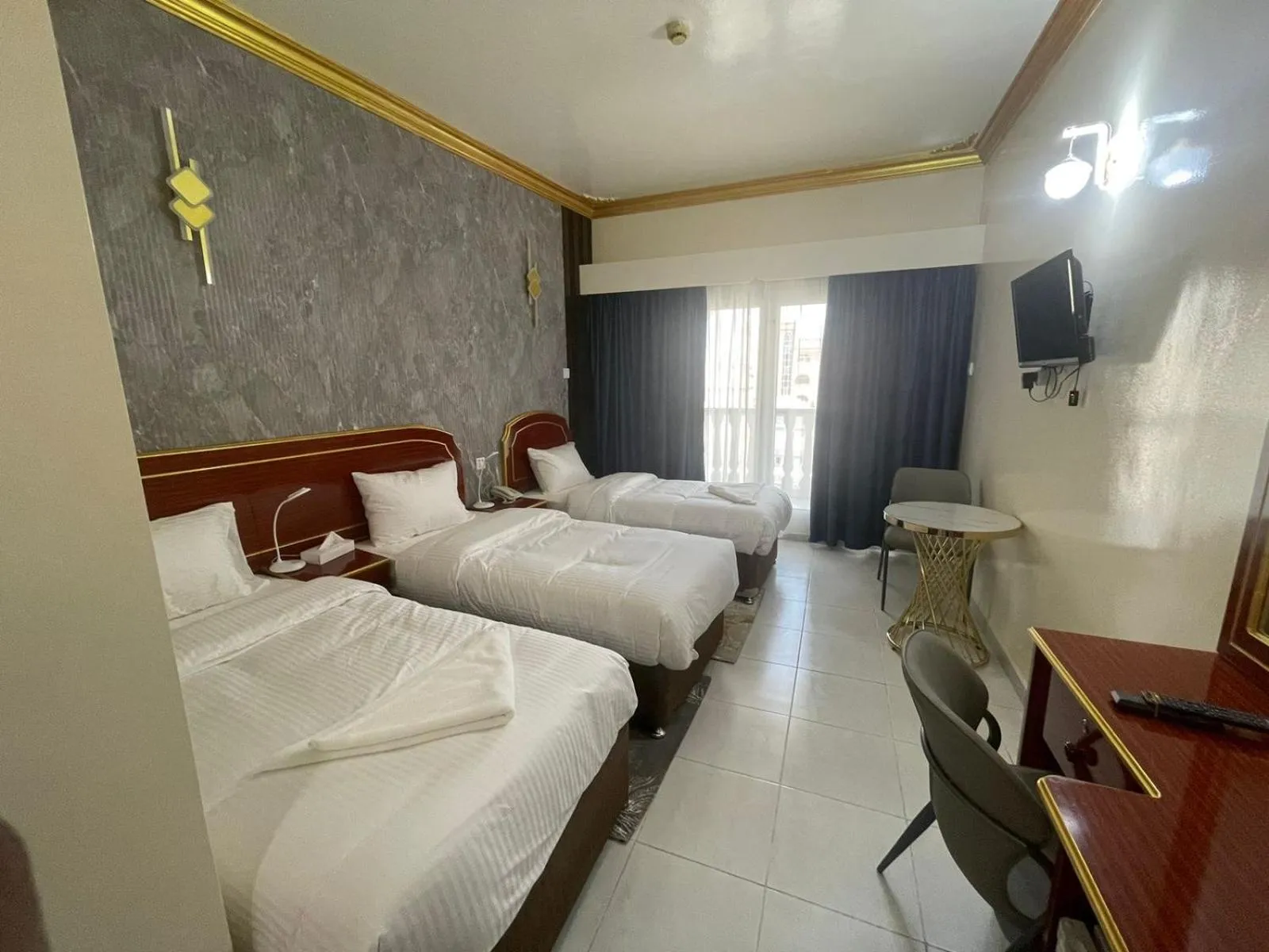 Bed in Galaxy Star Hotel