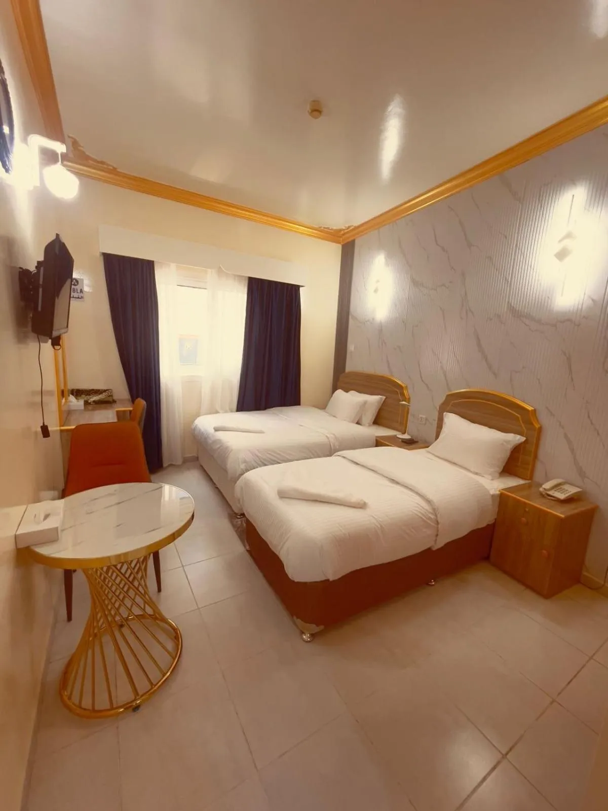 Bed in Galaxy Star Hotel