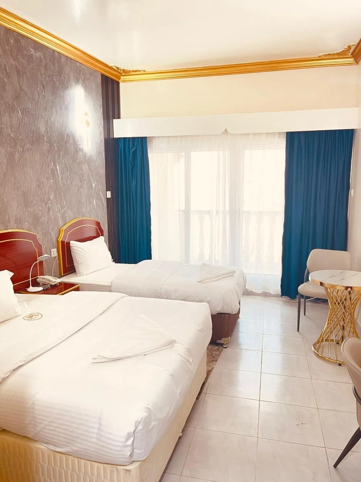 Bed in Galaxy Star Hotel