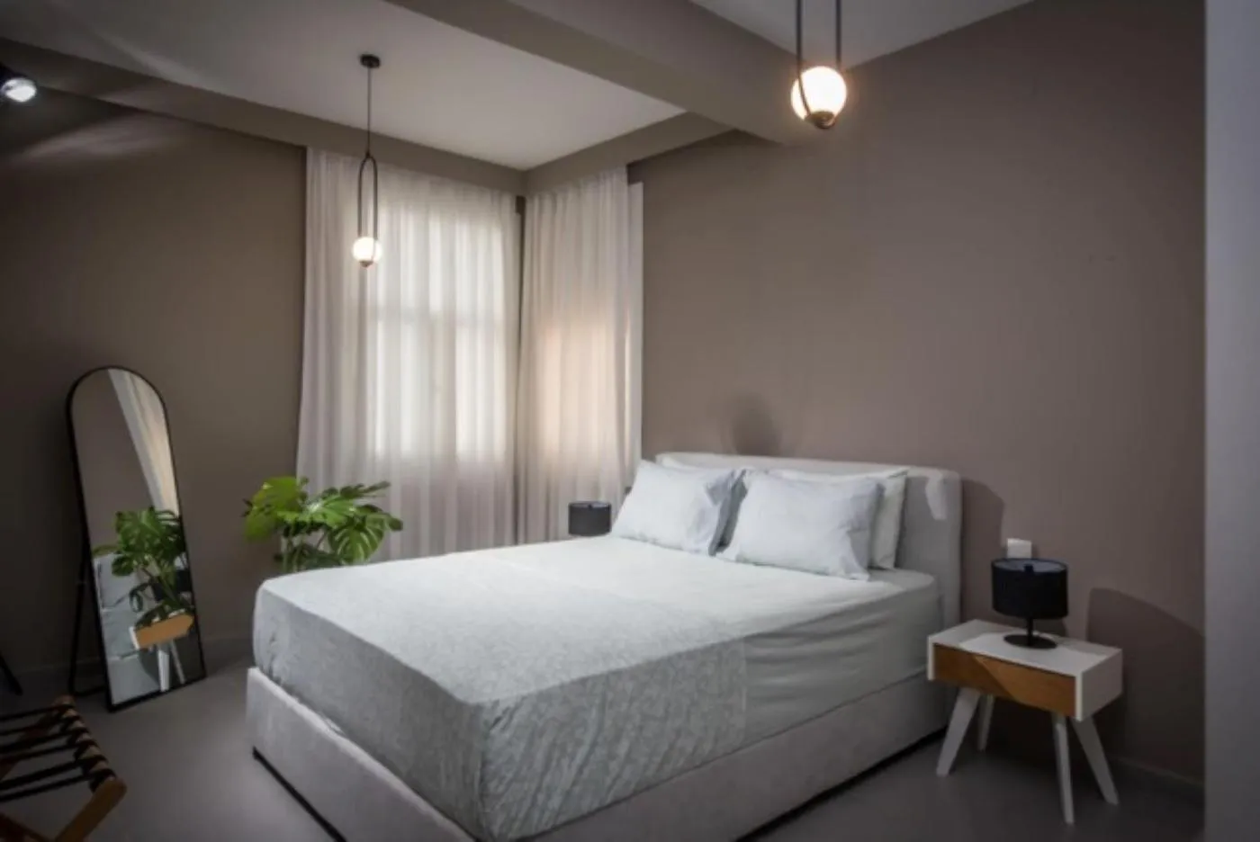 Bed in Centro Vero Suites by Omilos Hotels