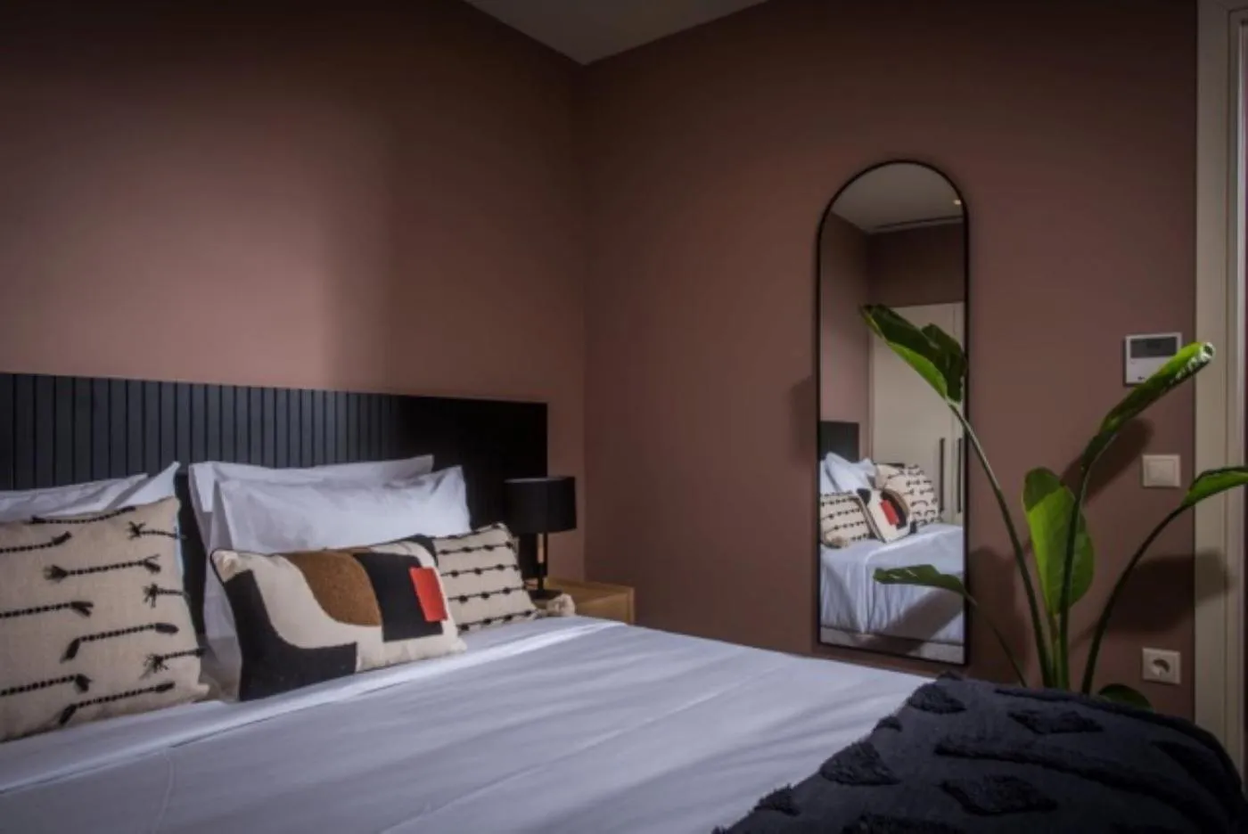 Bed in Centro Vero Suites by Omilos Hotels